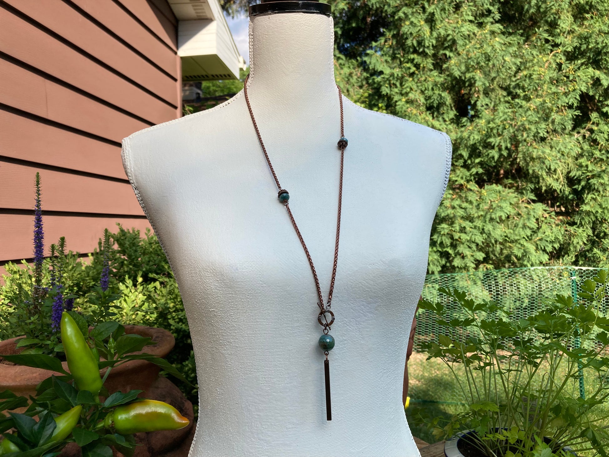 extra long copper necklace with stamped copper tag and turquoise accents