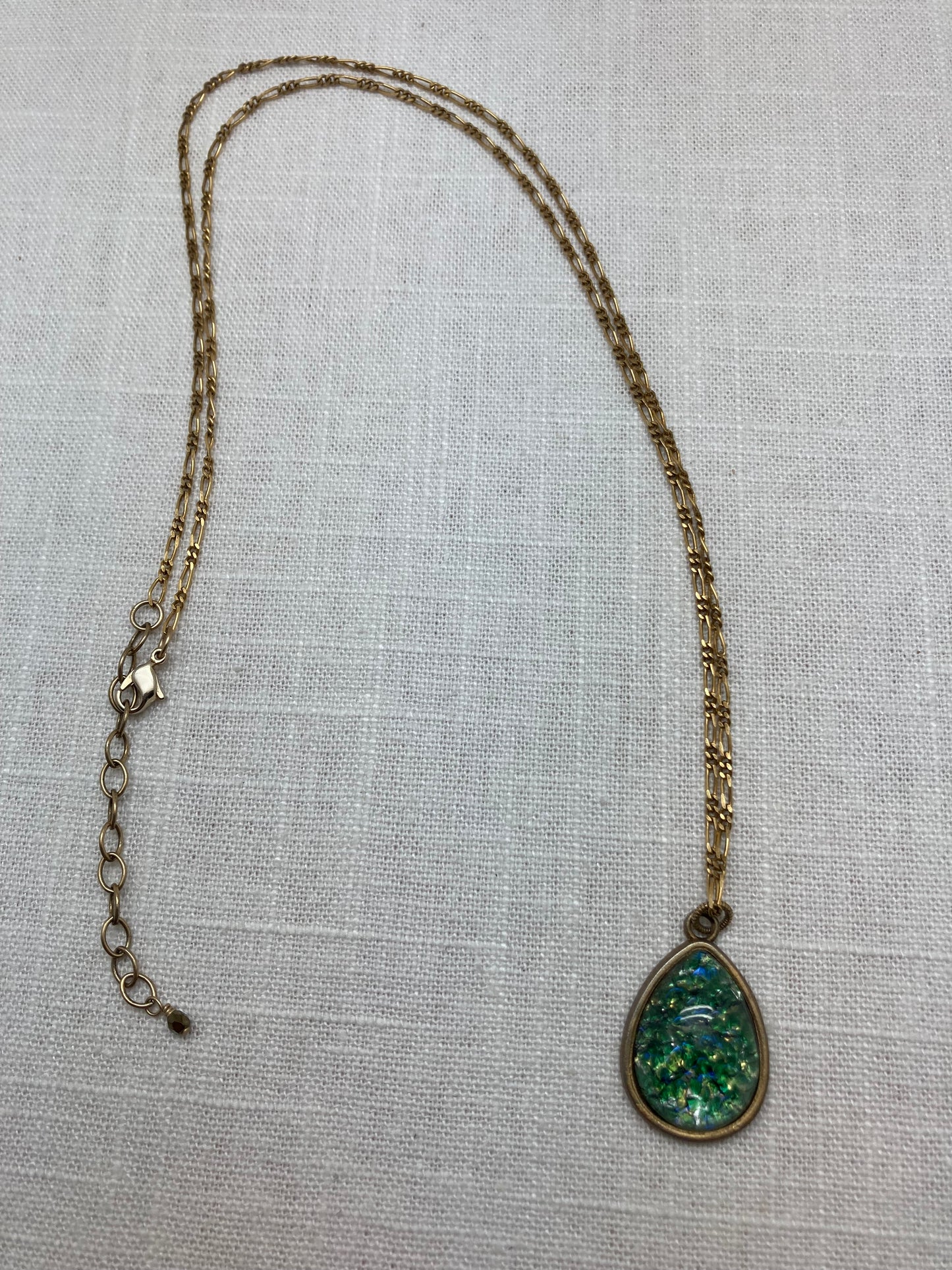 vintage brass chain with large green glass pendant
