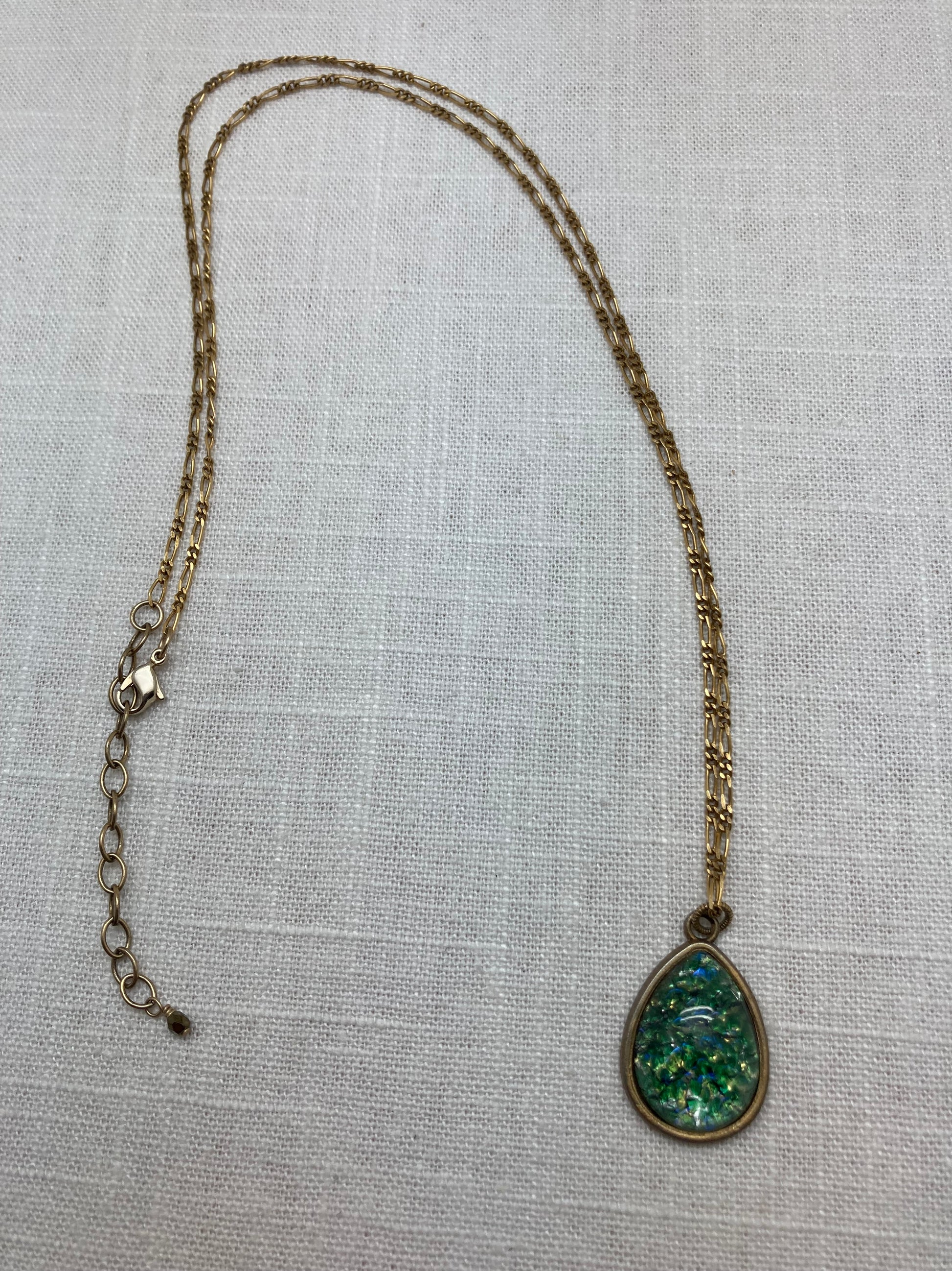 vintage brass chain with large green glass pendant