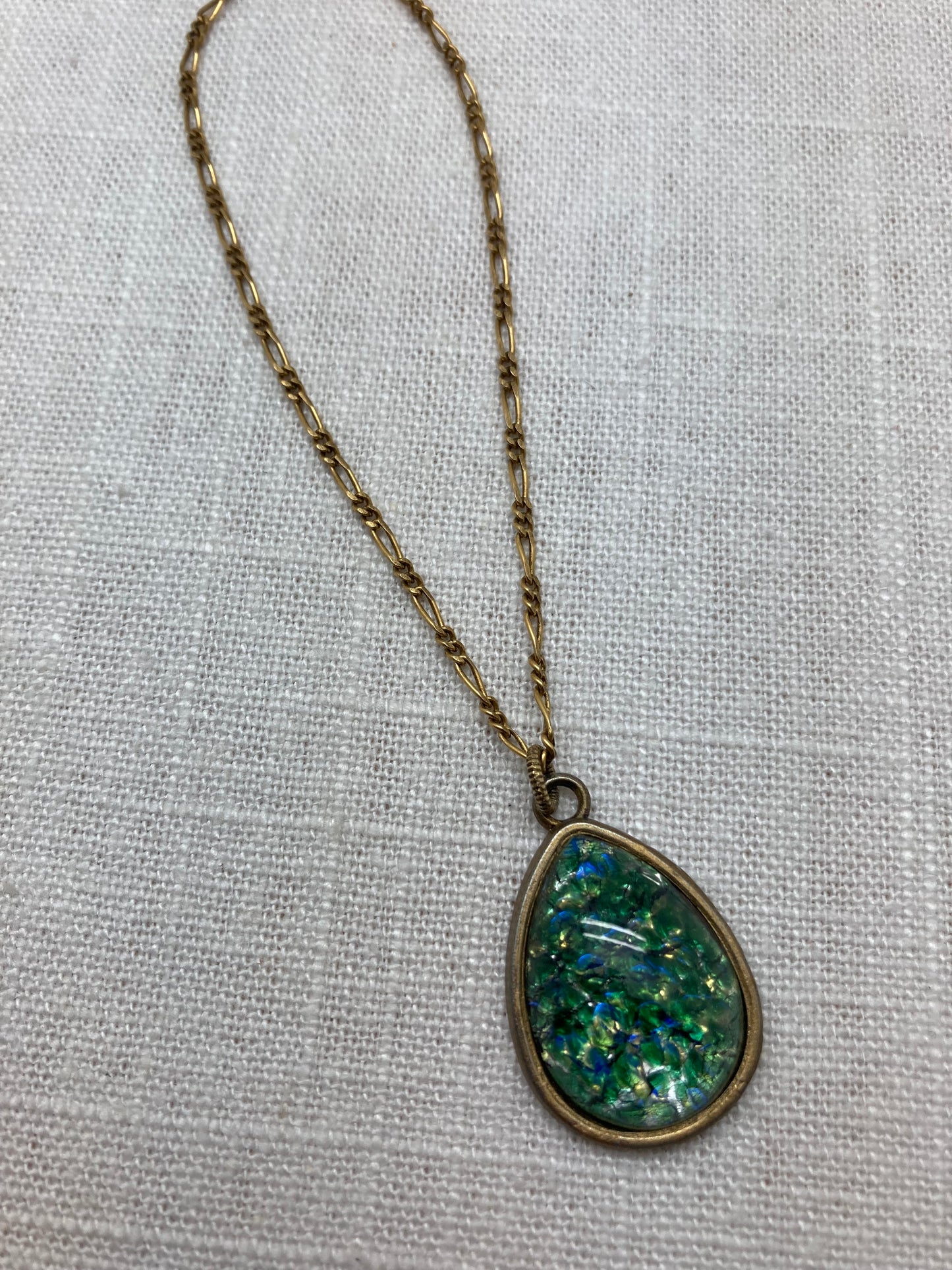 green glass teardrop pendant necklace on brass chain
