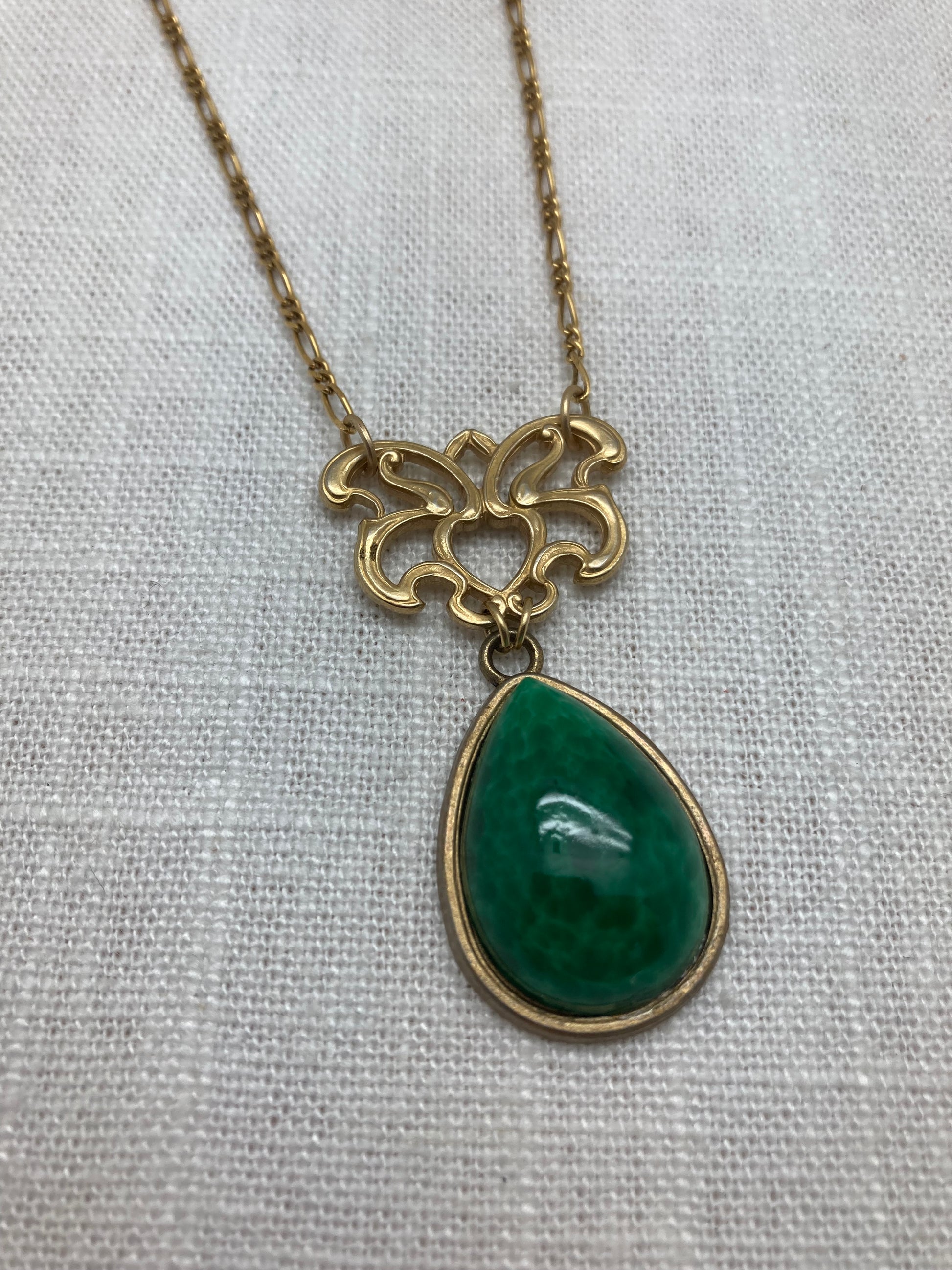 vintage brass chain necklace with jade pendant and intricate connector