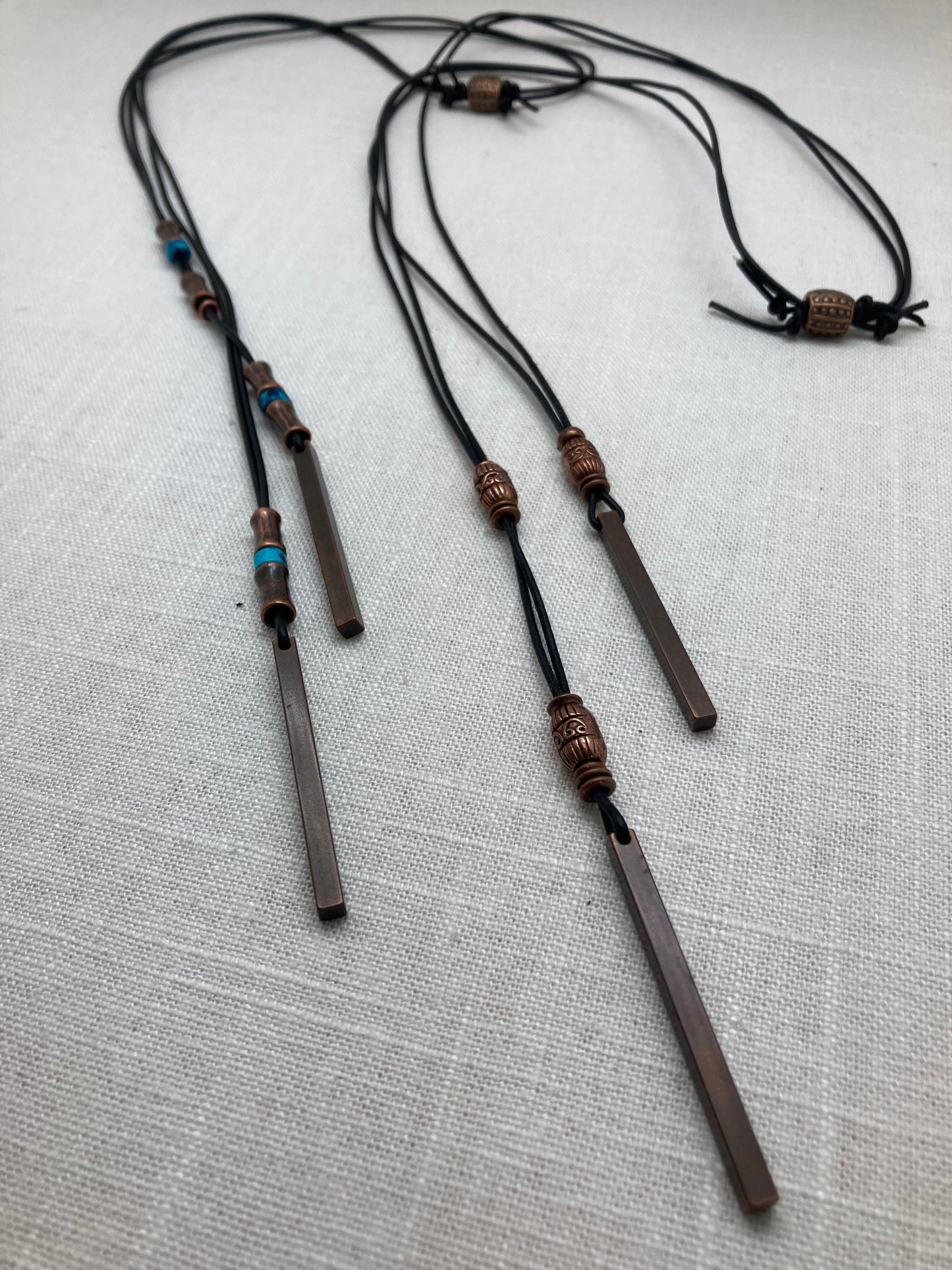 adjustable leather lariat necklace with copper bar