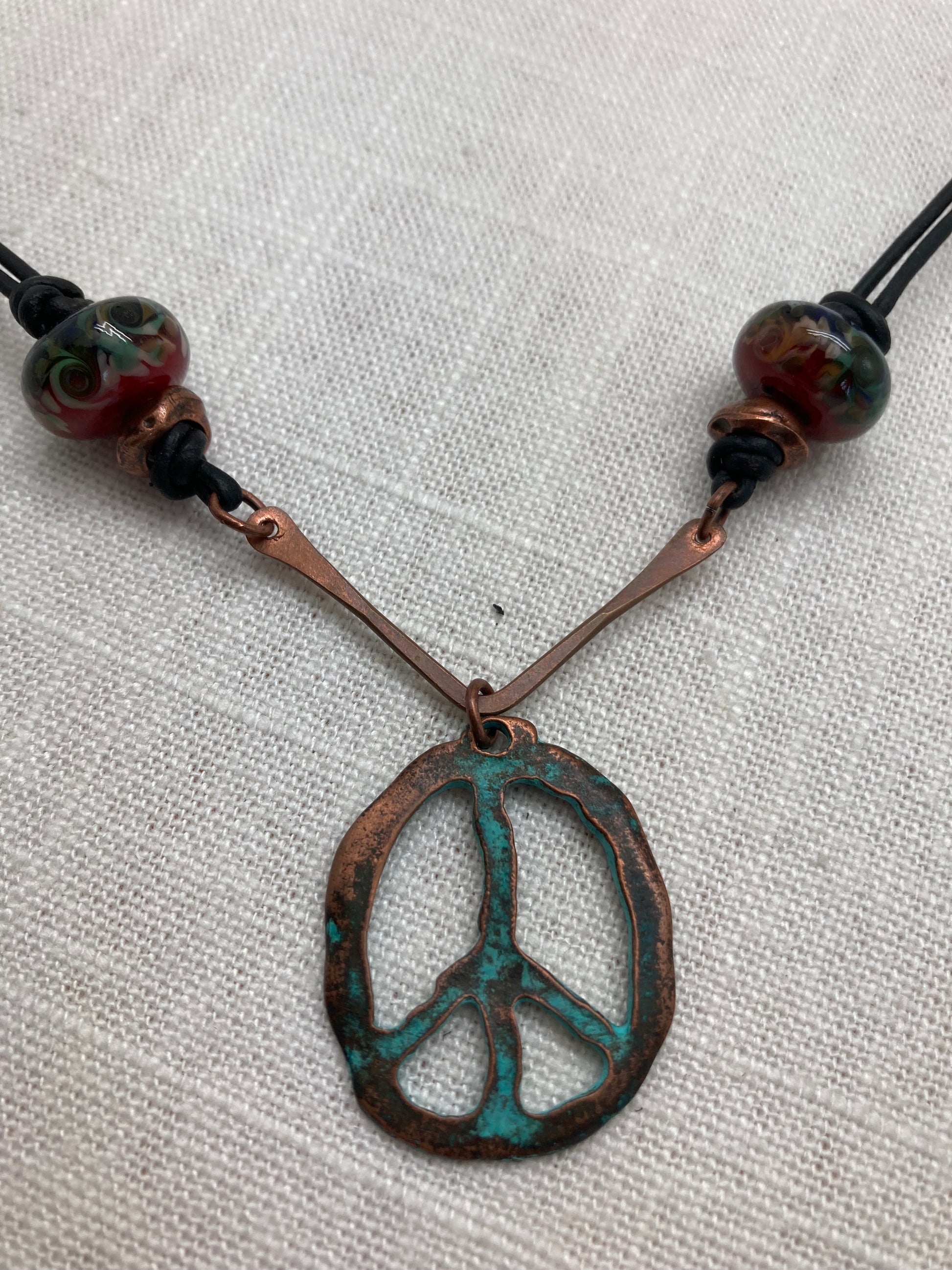 patina peace sign necklace