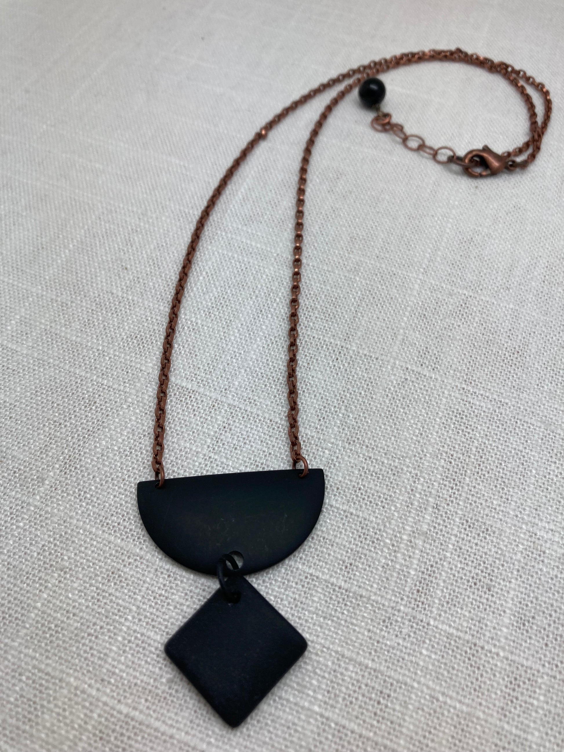 black geometric necklace