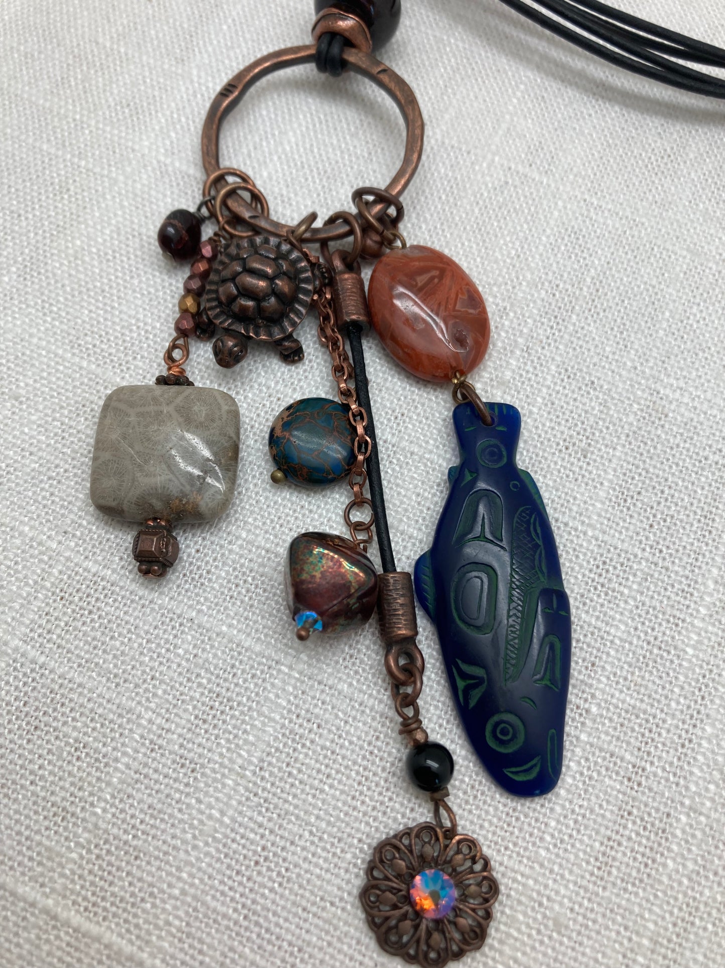 leather necklace with nature charms, salmon and turtle, colorful