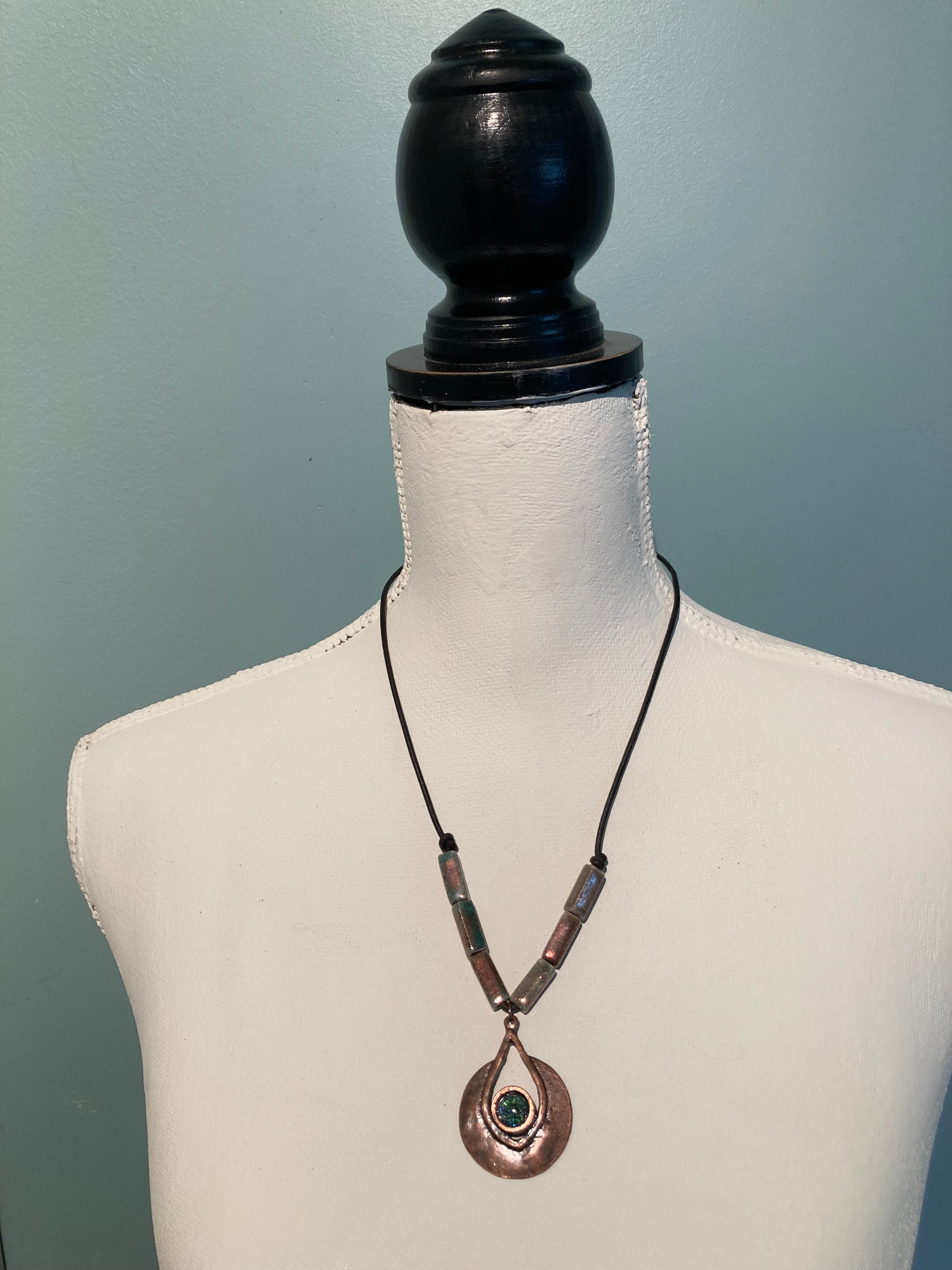 large copper pendant necklace with glass bead