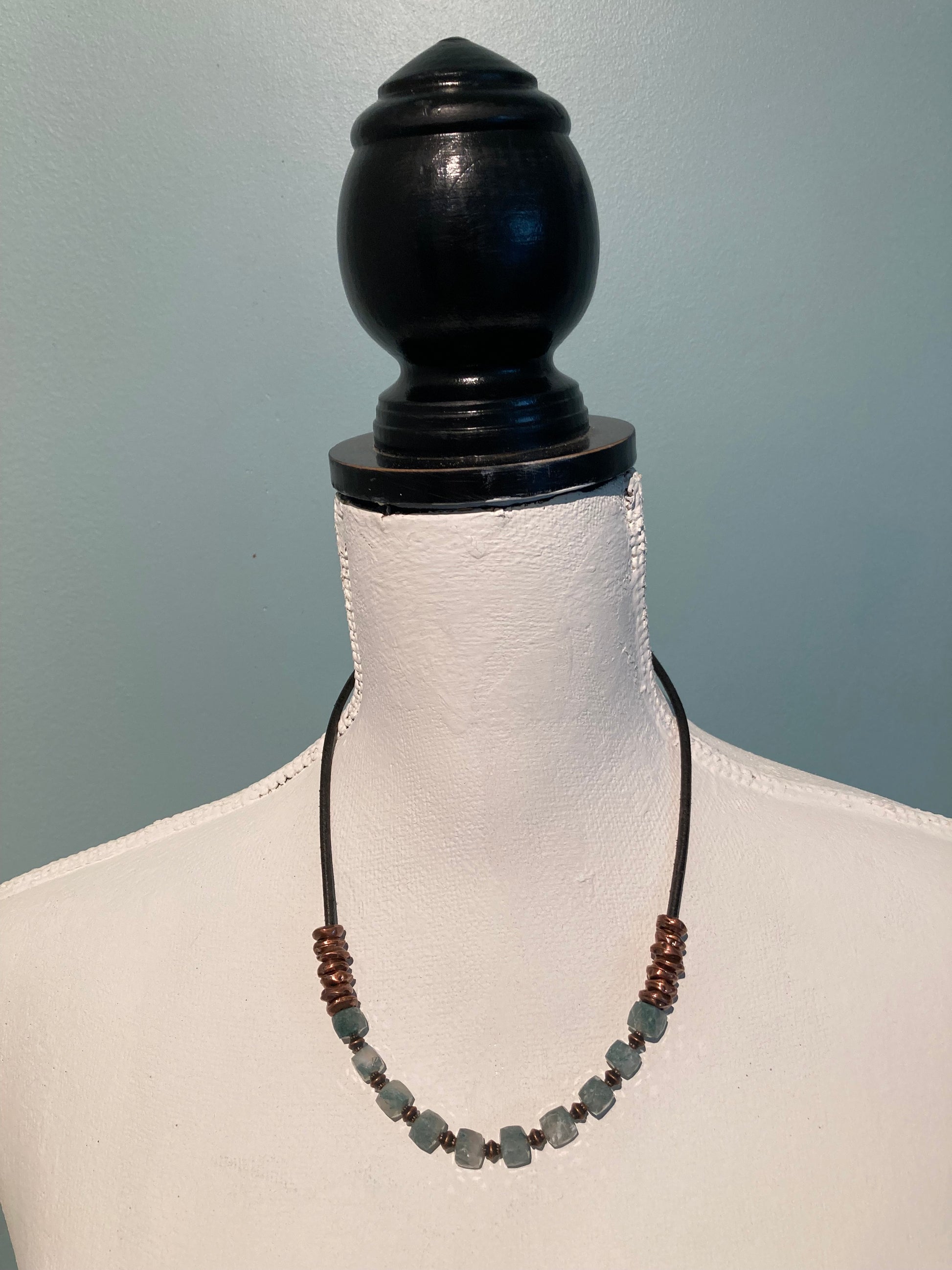 cube-shaped gemstone necklace with copper on leather