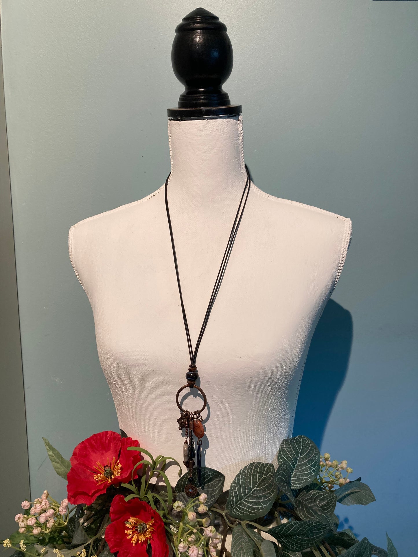 long leather charm necklace