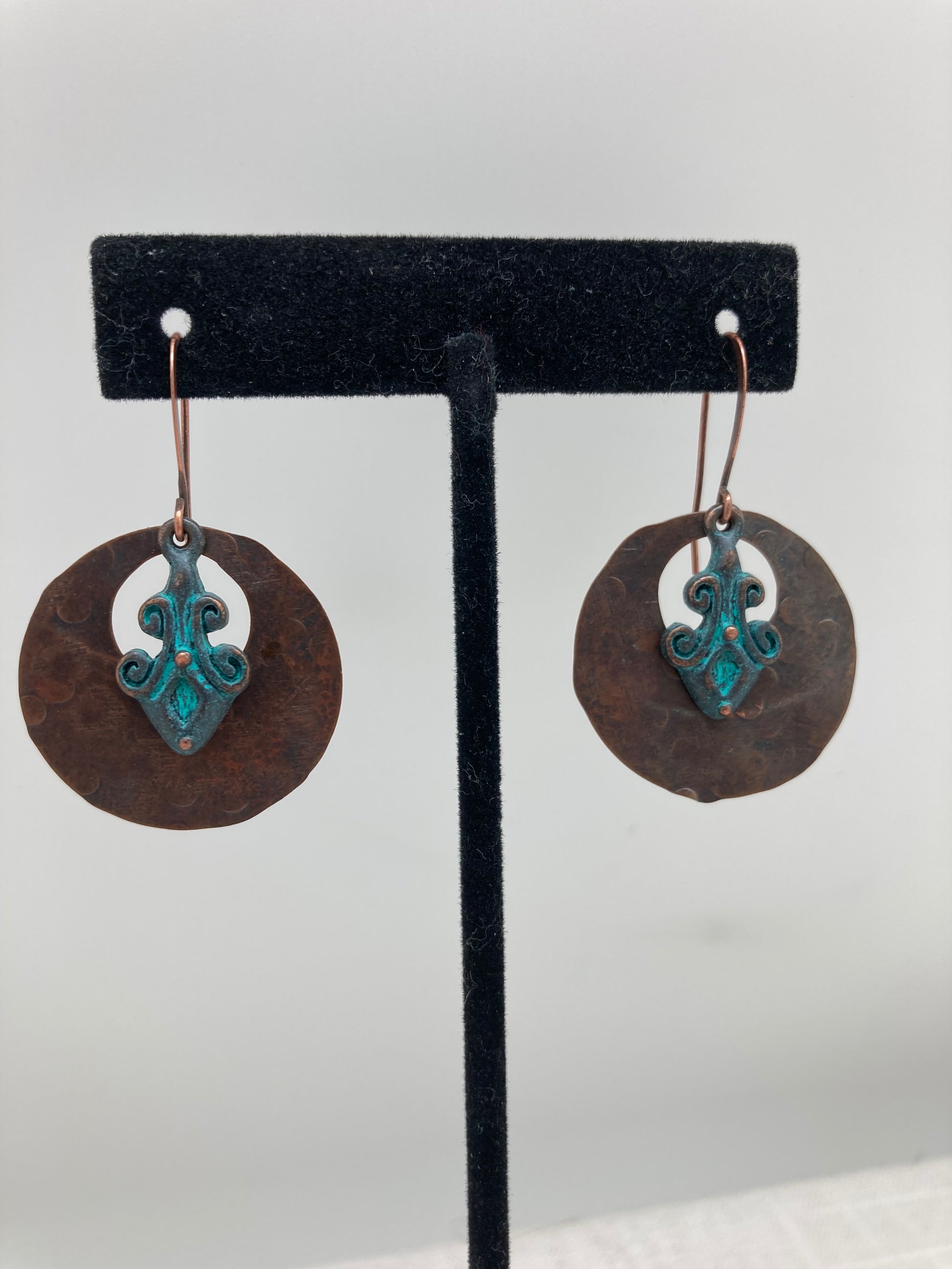 hammered copper dangle earrings with blue embellishment