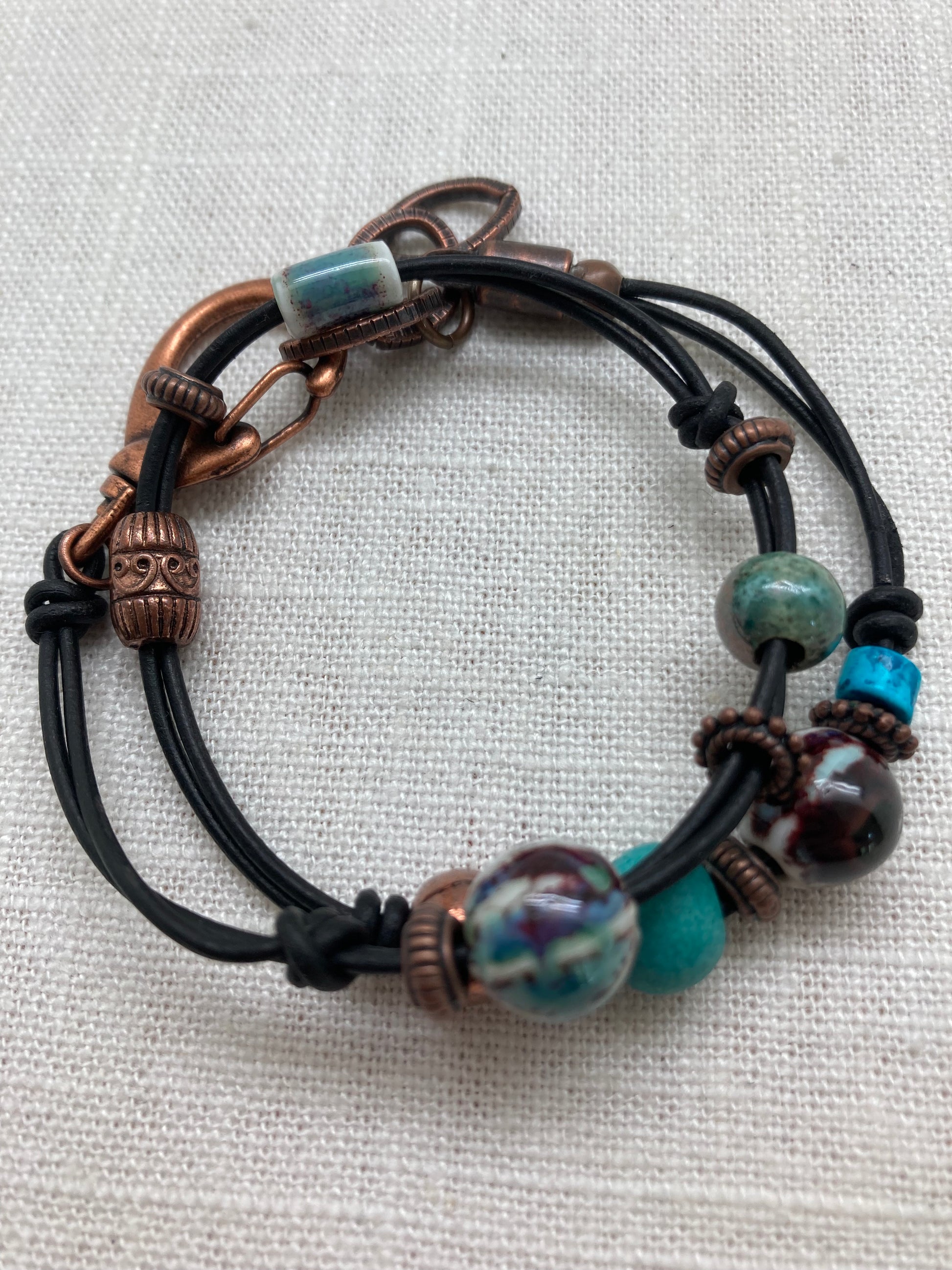 copper, ceramic bead, and leather wrap bracelet