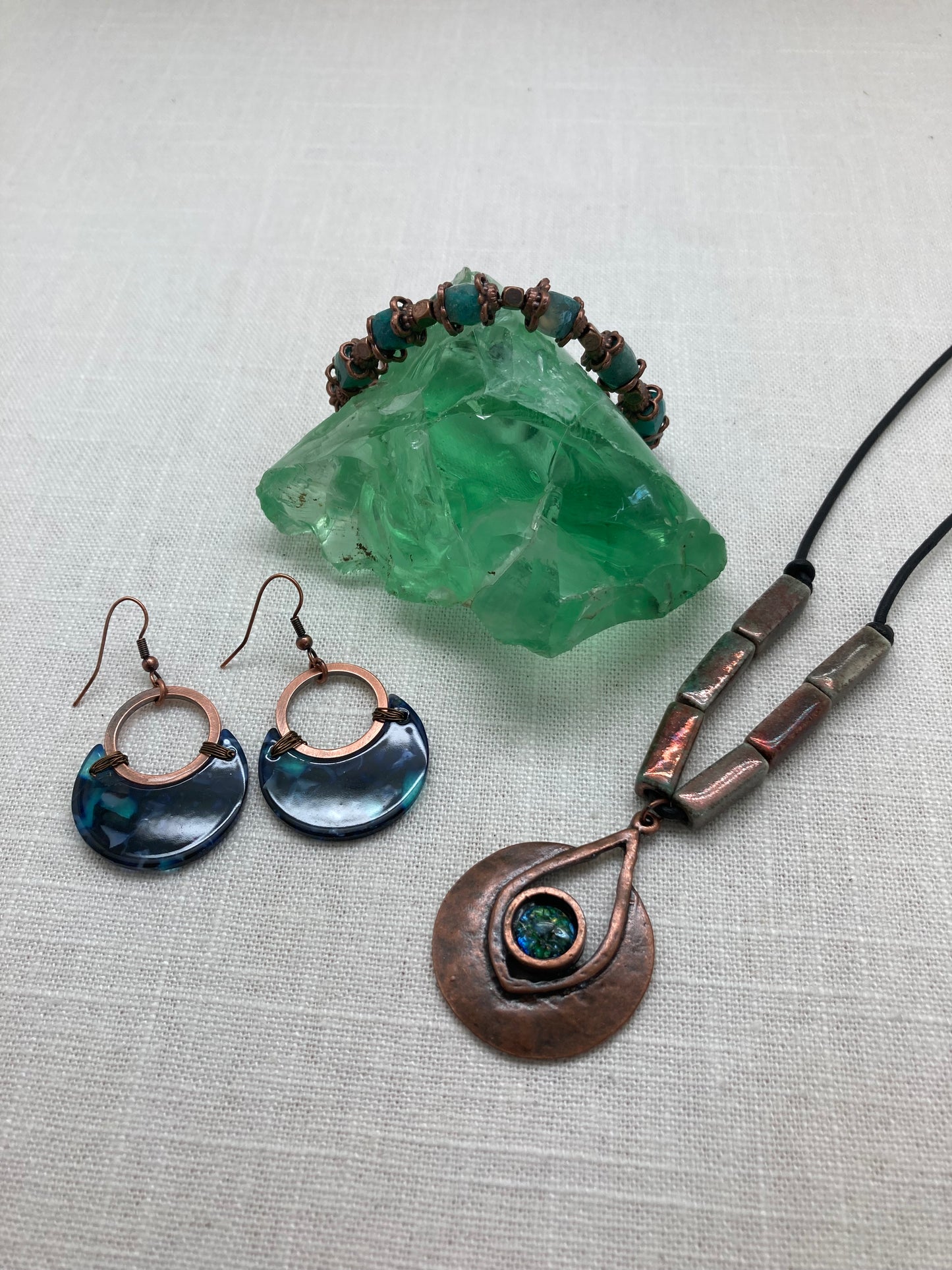 copper circle earrings with blue acrylic