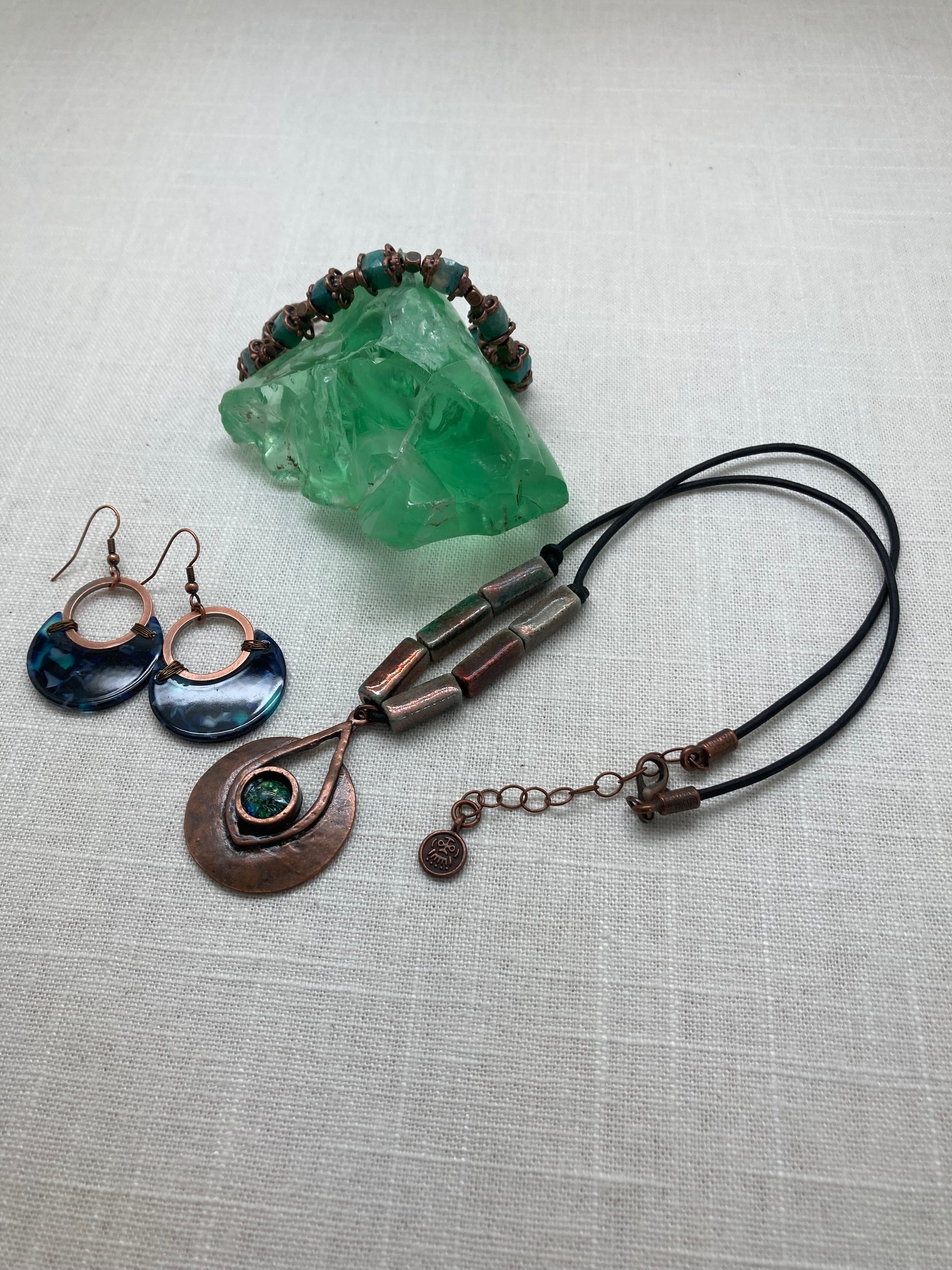 leather and copper pendant necklace with beads and glass