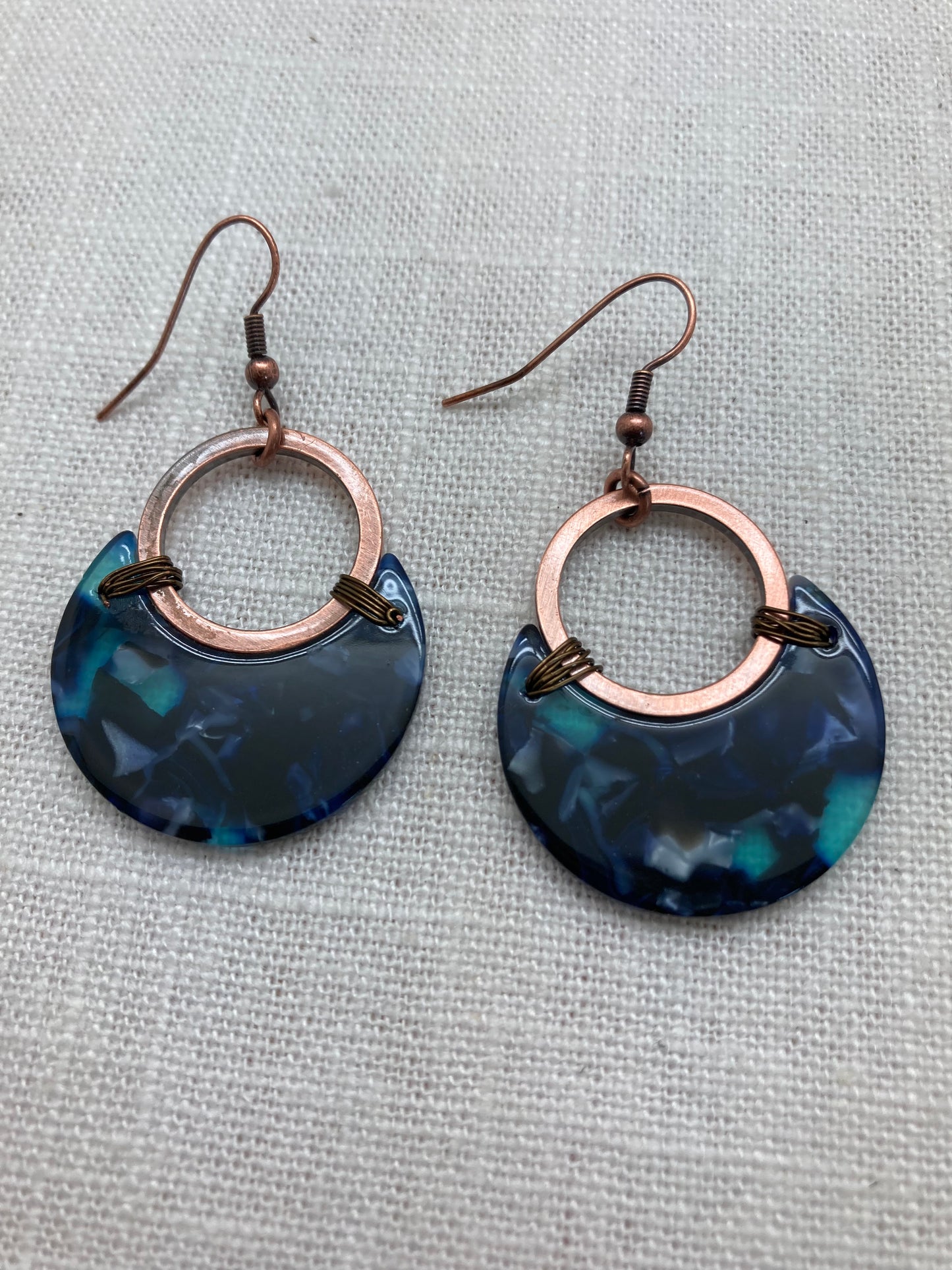 copper moon-shaped earrings