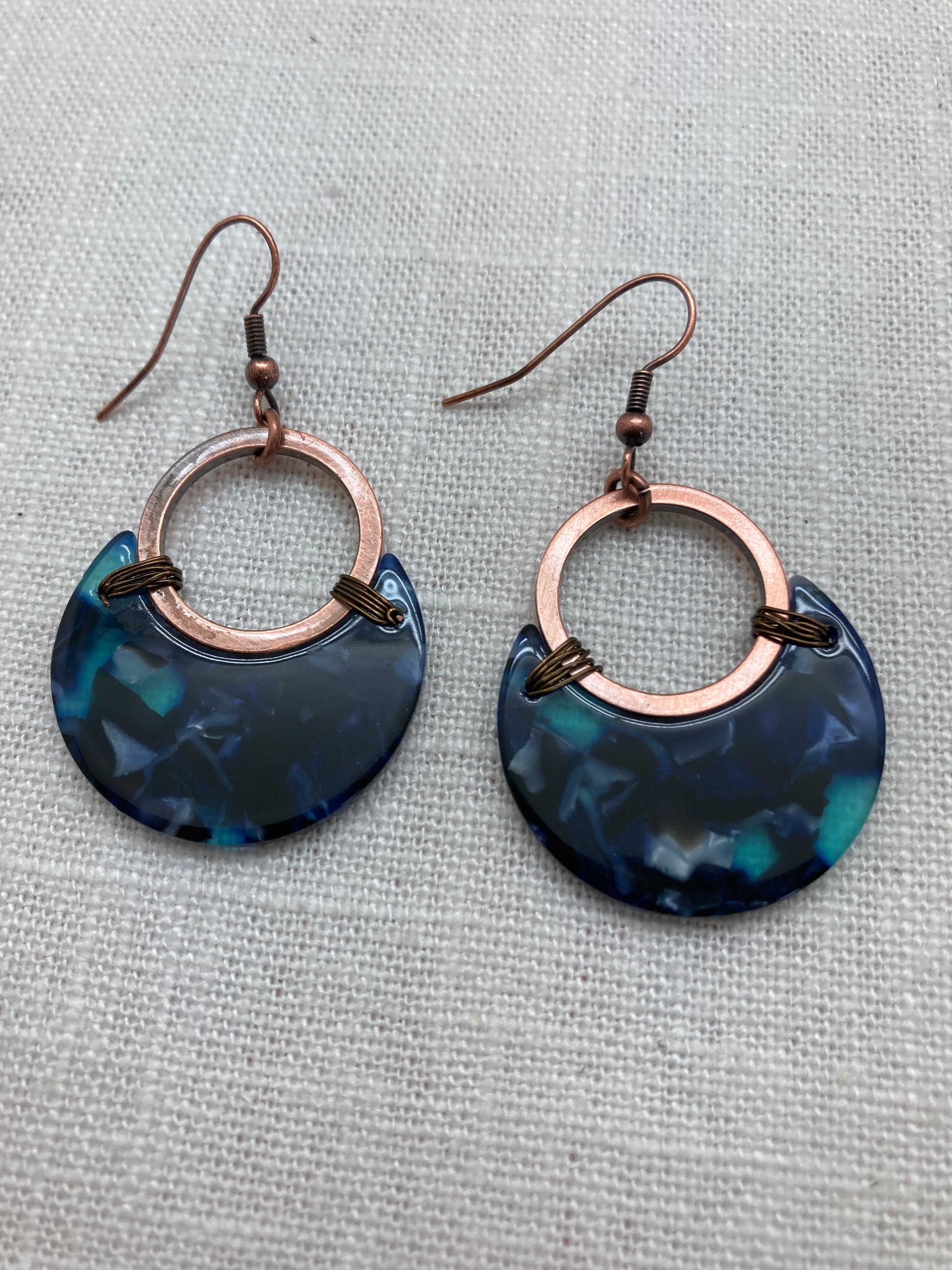 copper moon-shaped earrings