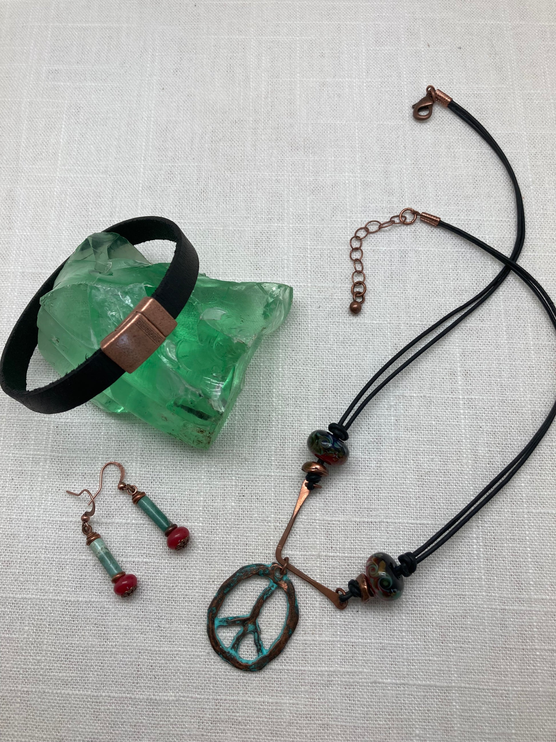 leather necklace with glass beads and peace