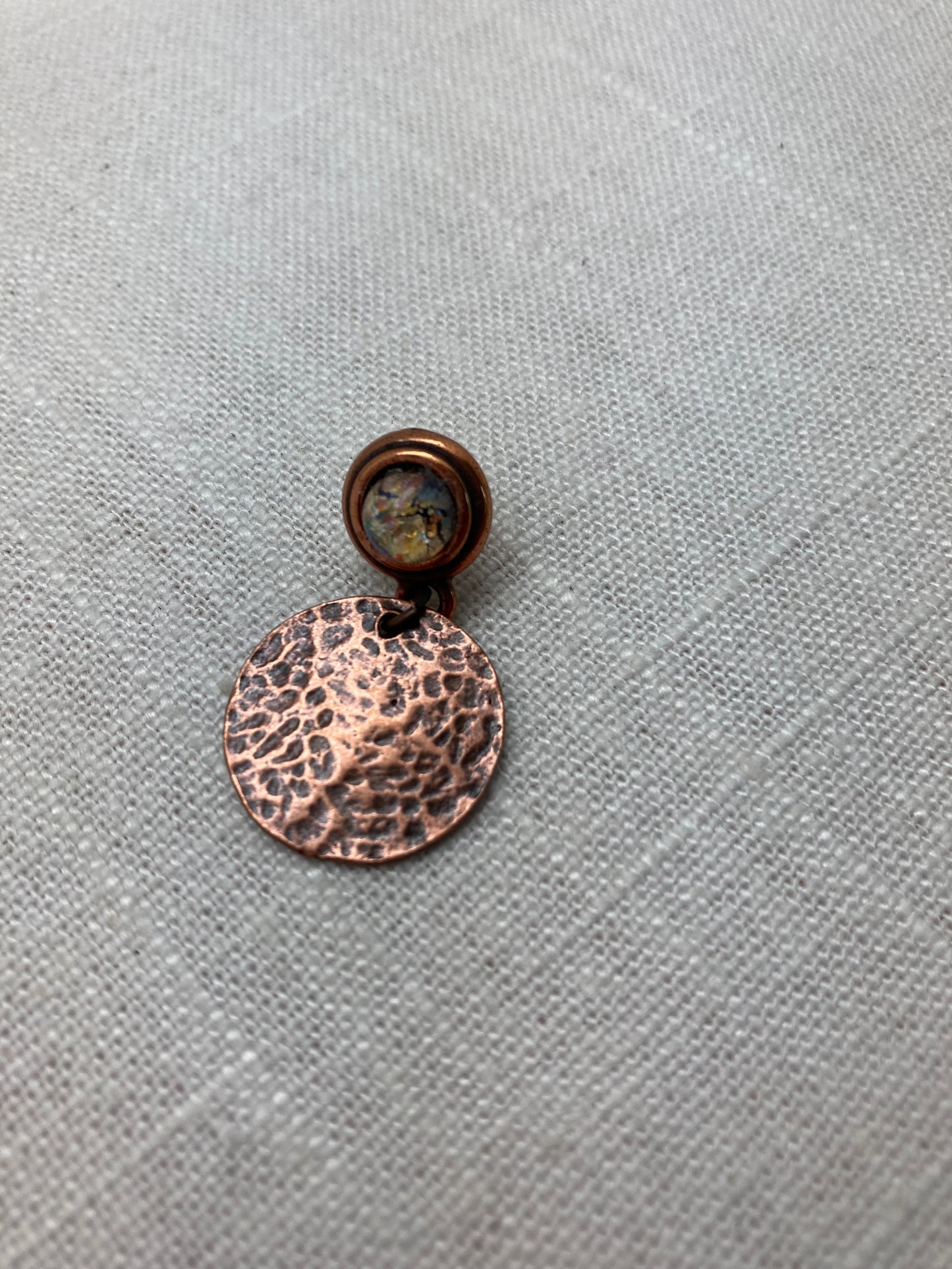 Opal glass with copper drop