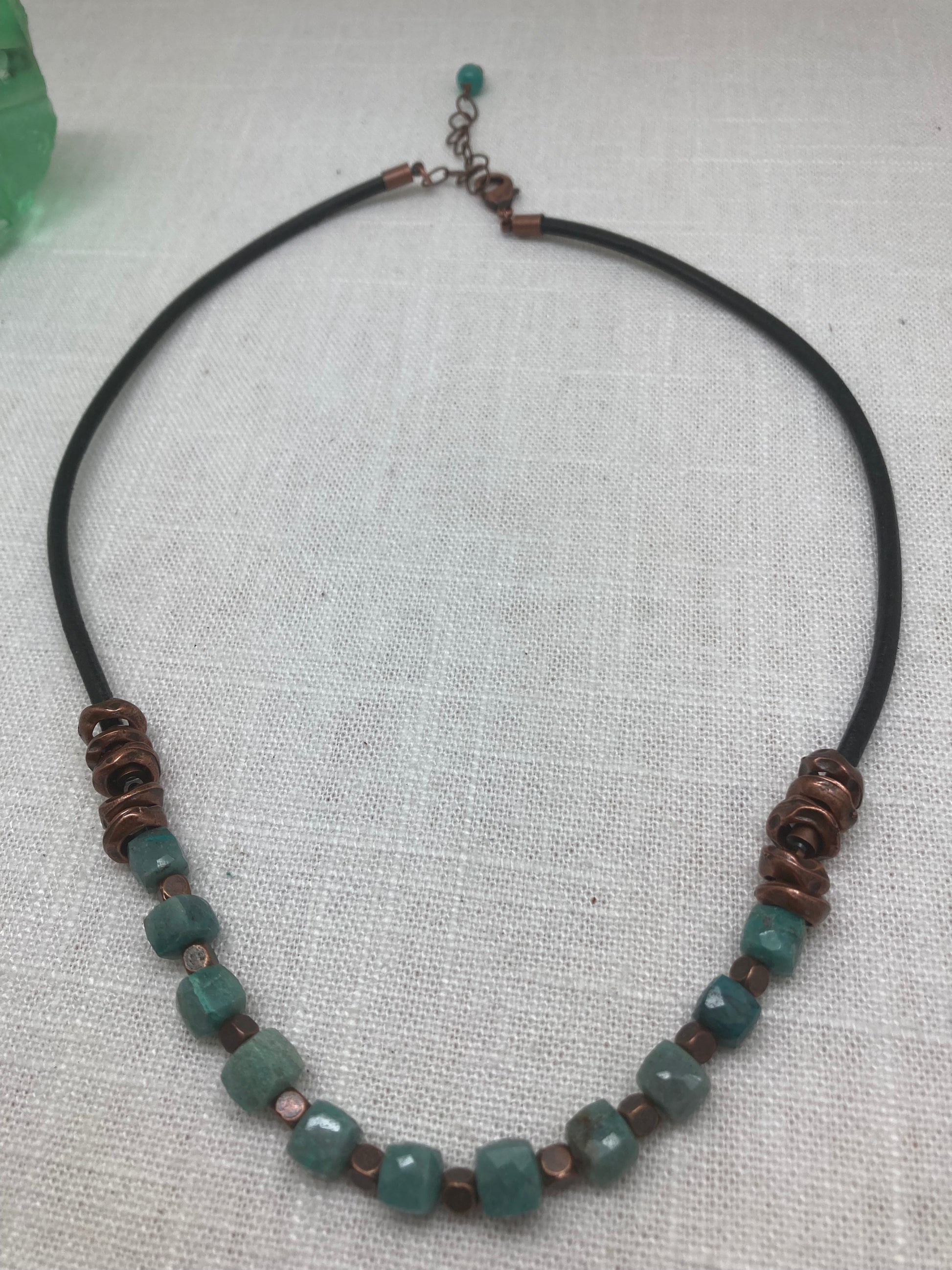 leather necklace with cube-shaped gems and copper beads