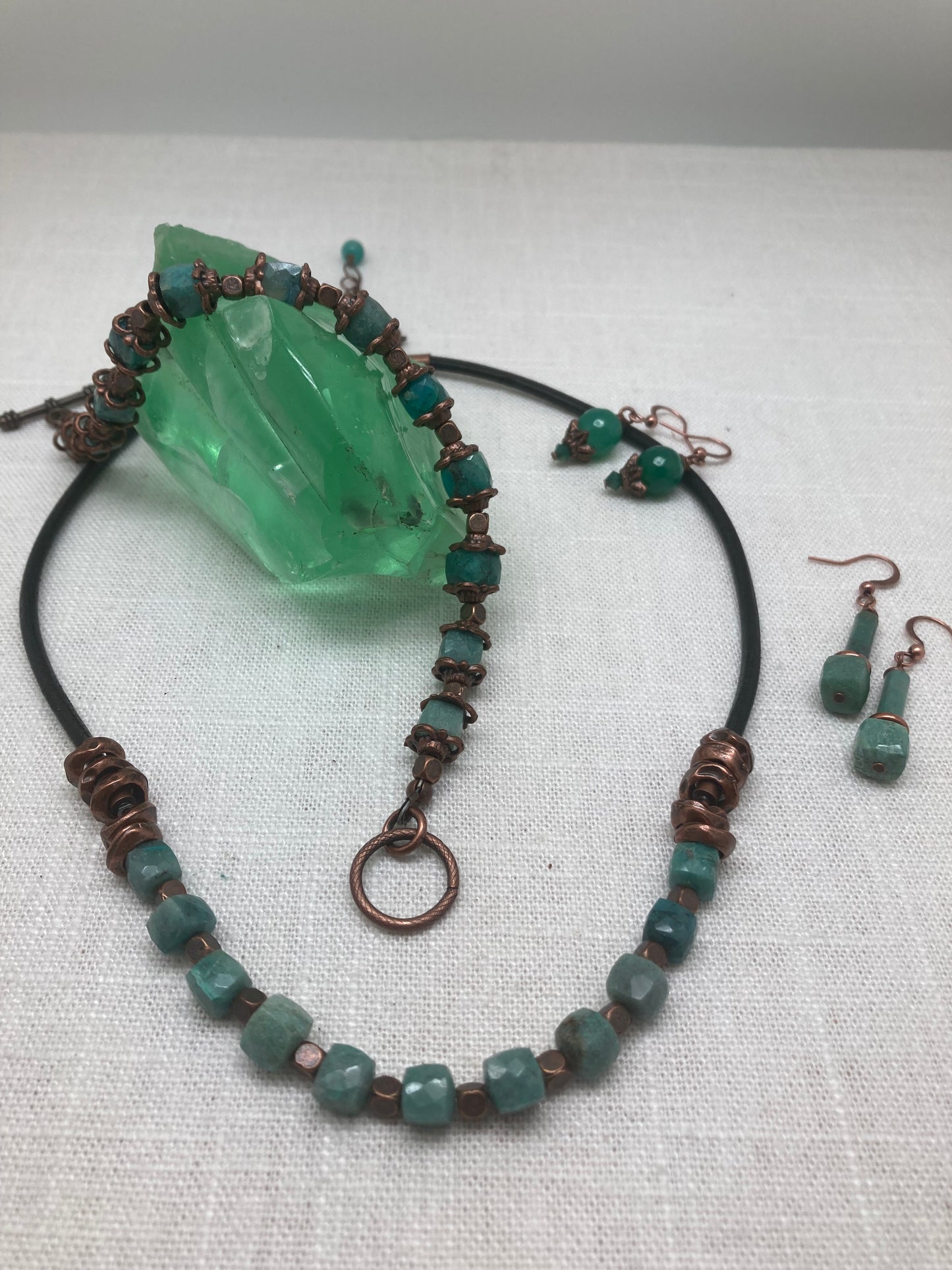 green amazonite necklace, earrings, and bracelet paired with rustic copper