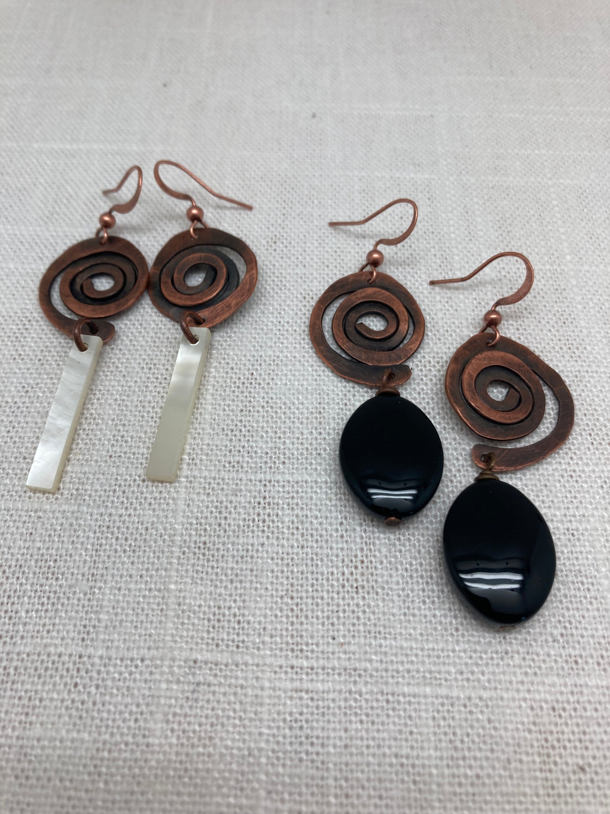 copper swirl dangle earrings black and white