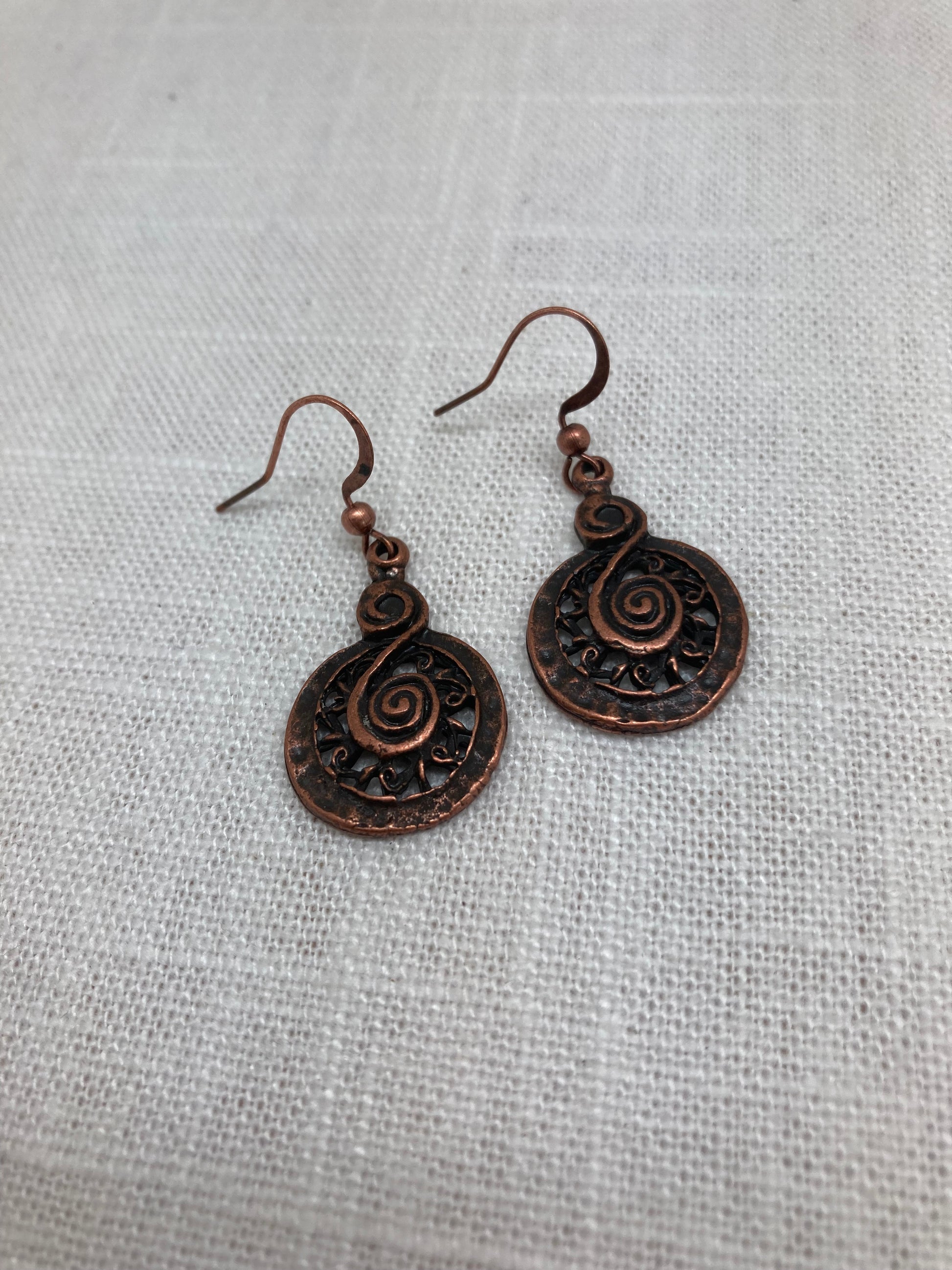 dangly copper spiral medallion earrings