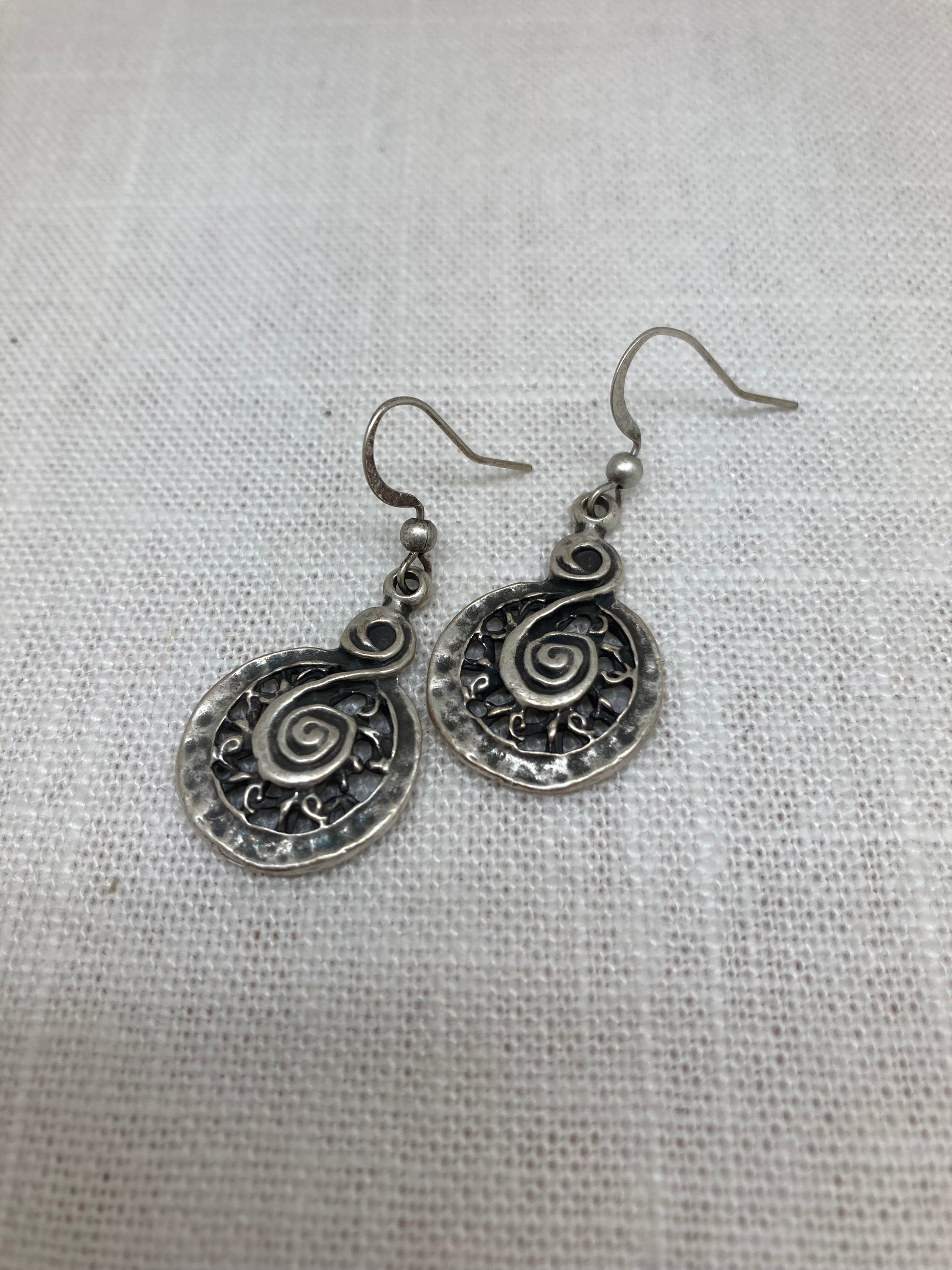 antique silver dangle earrings with spiral pattern
