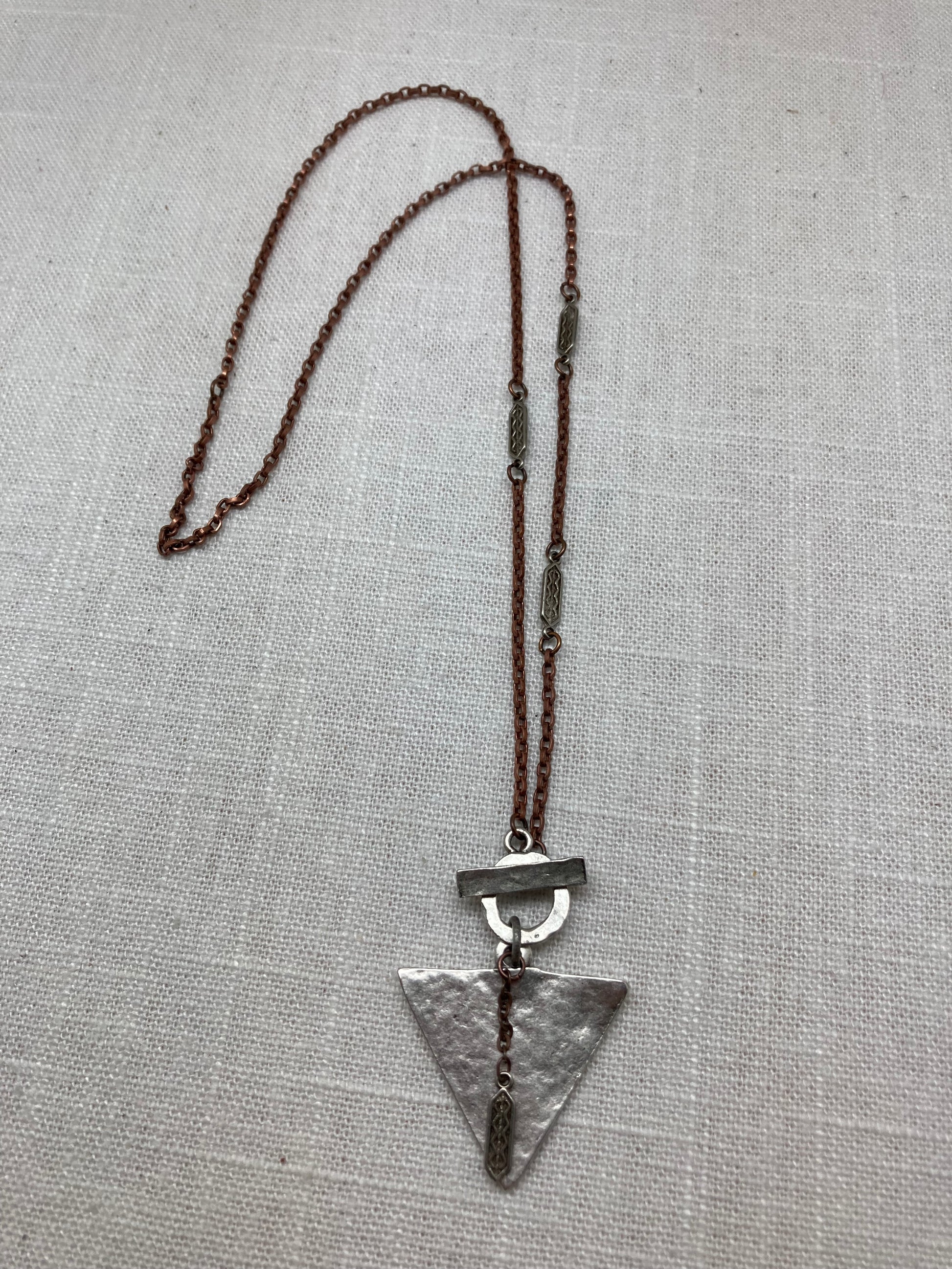 hammered silver triangle necklace with copper chain
