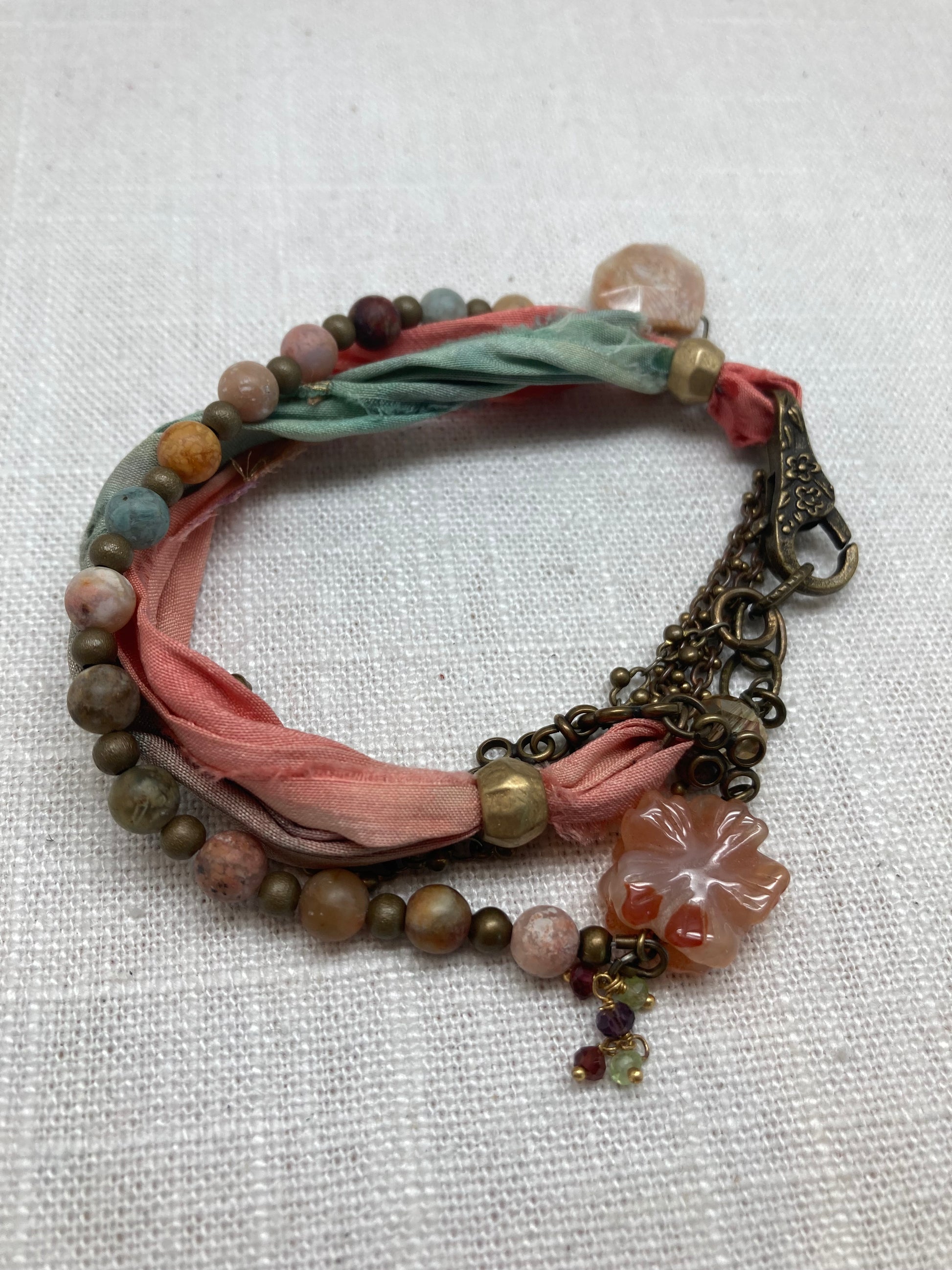 pink and blue pastel convertible necklace and bracelet with flower charm