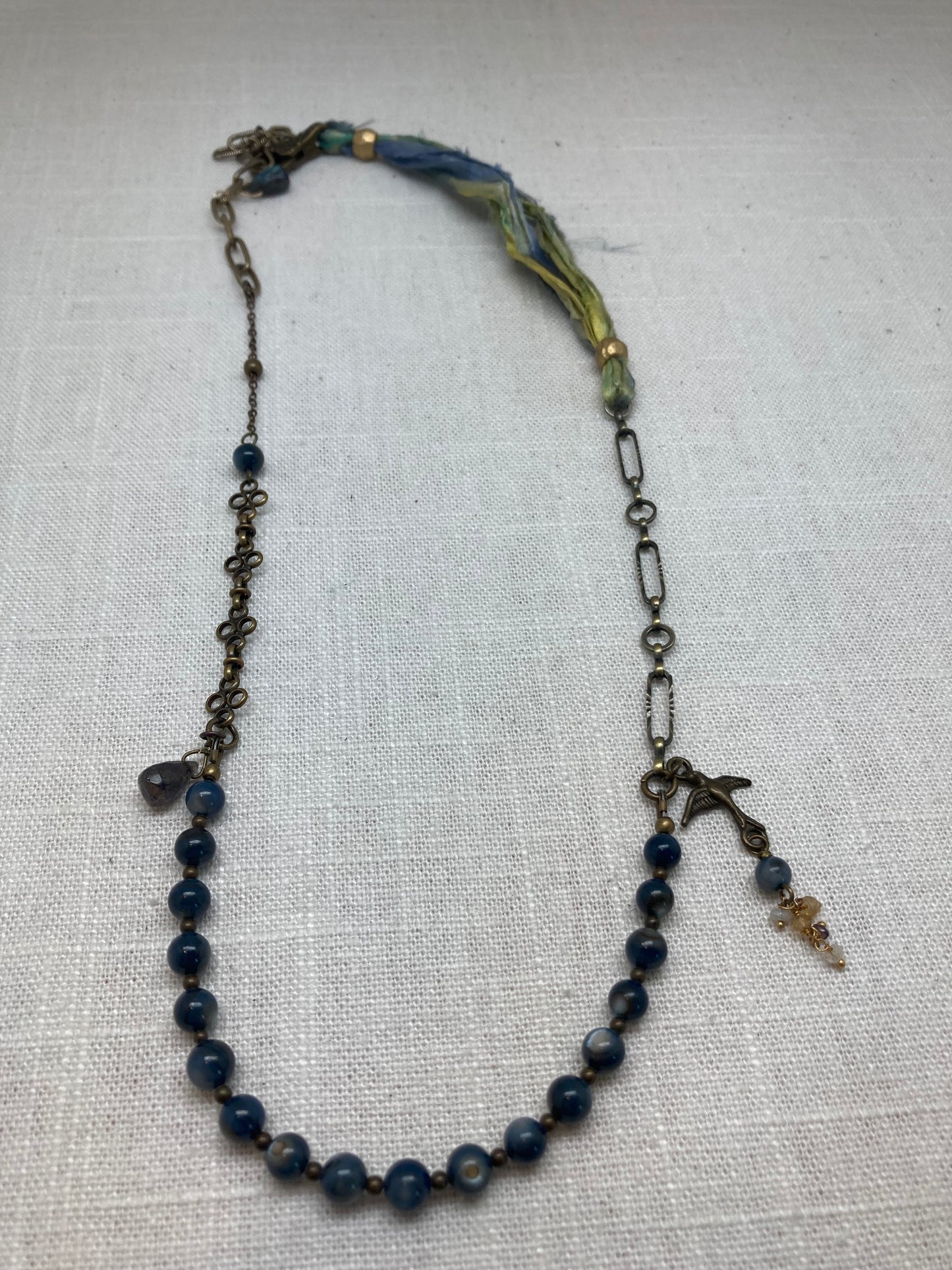 blue convertible bracelet/necklace with bird charm
