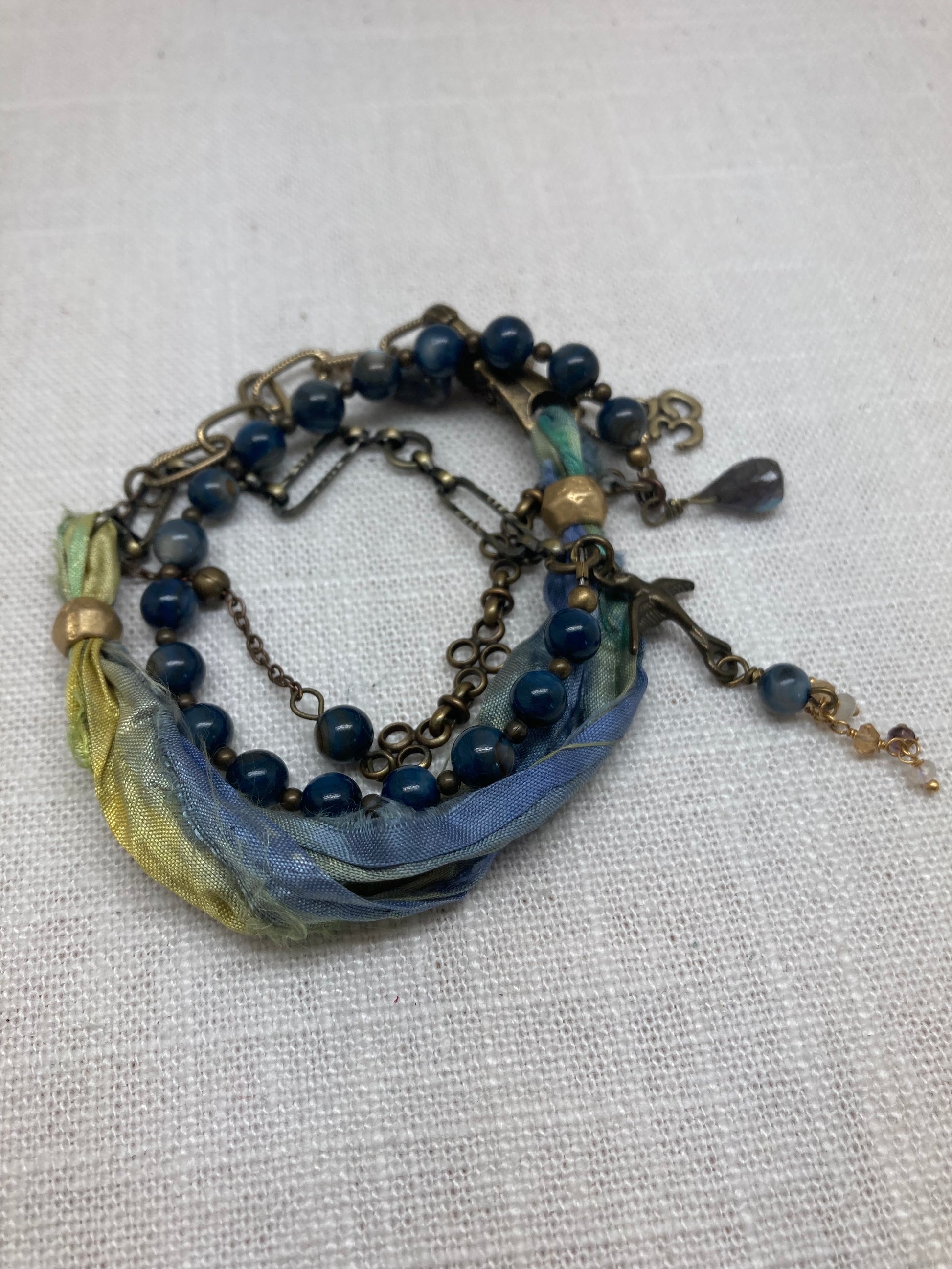 dark blue, yellow, and green wrap bracelet or necklace, convertible