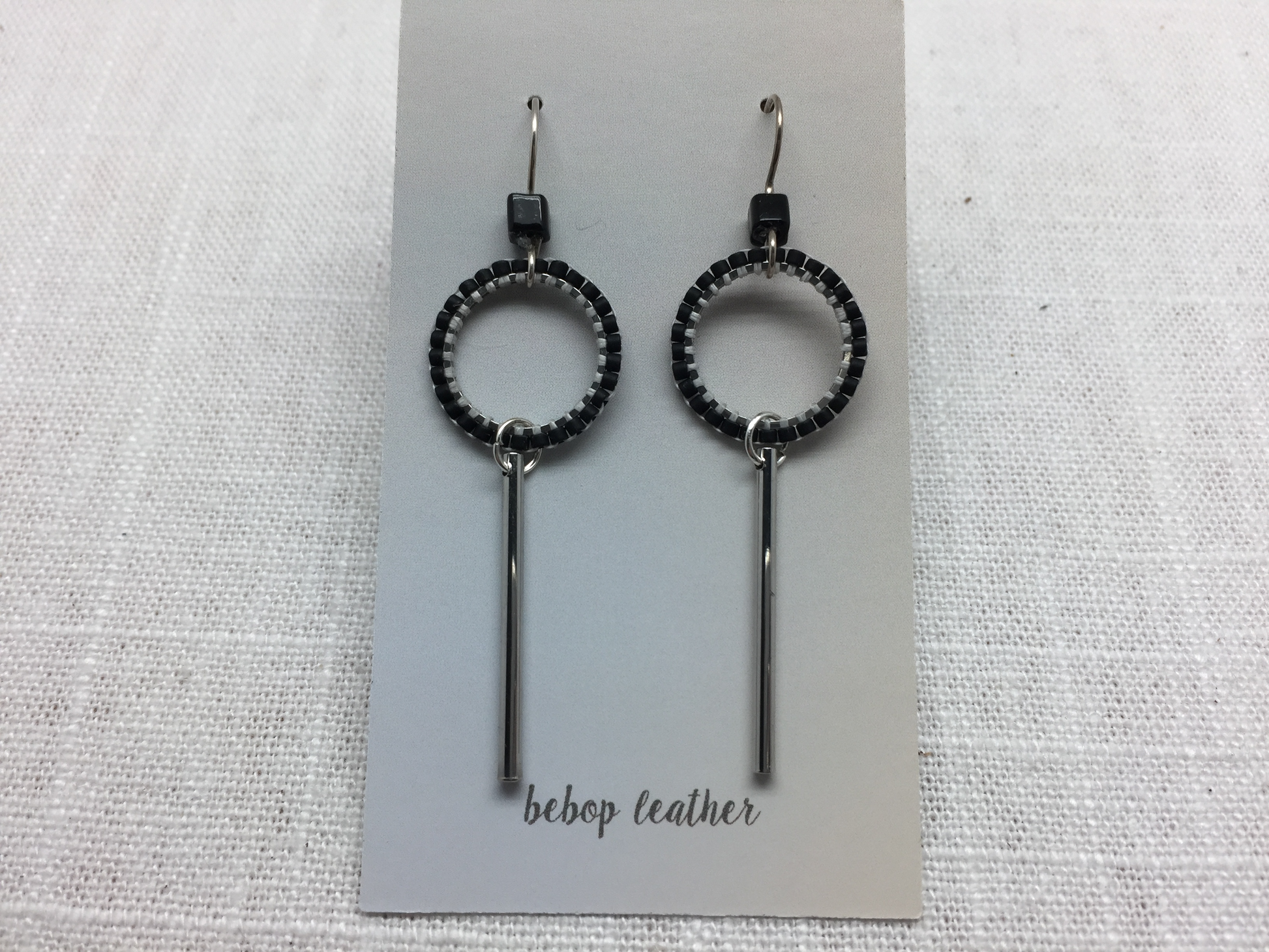 silver dangle earrings with beads