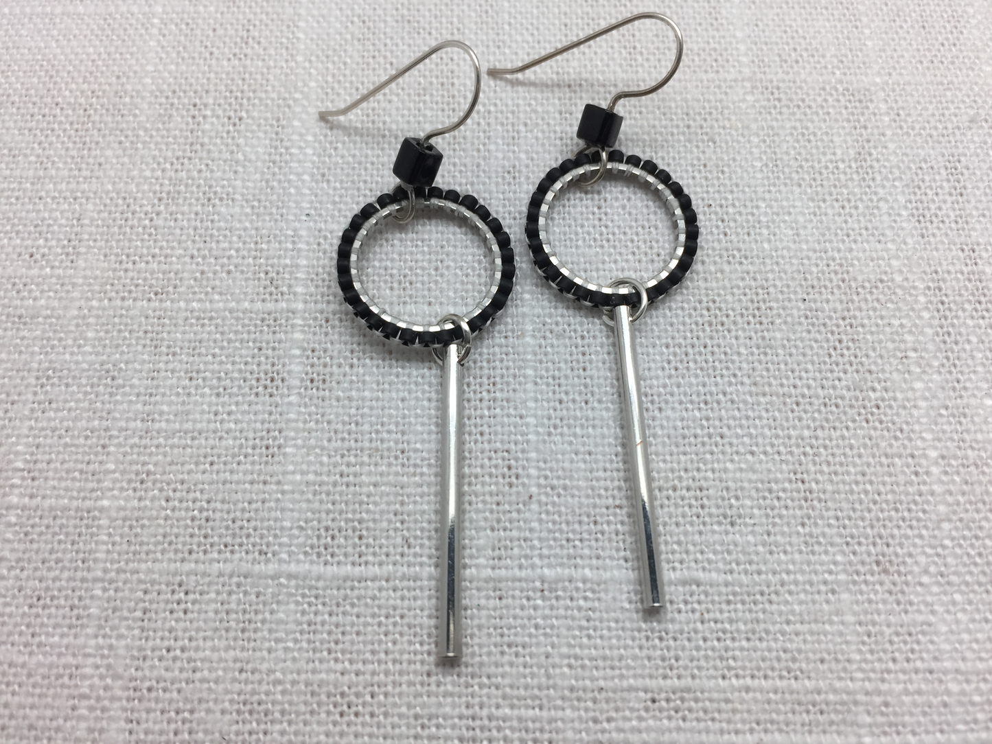 beaded silver loop dangle earrings