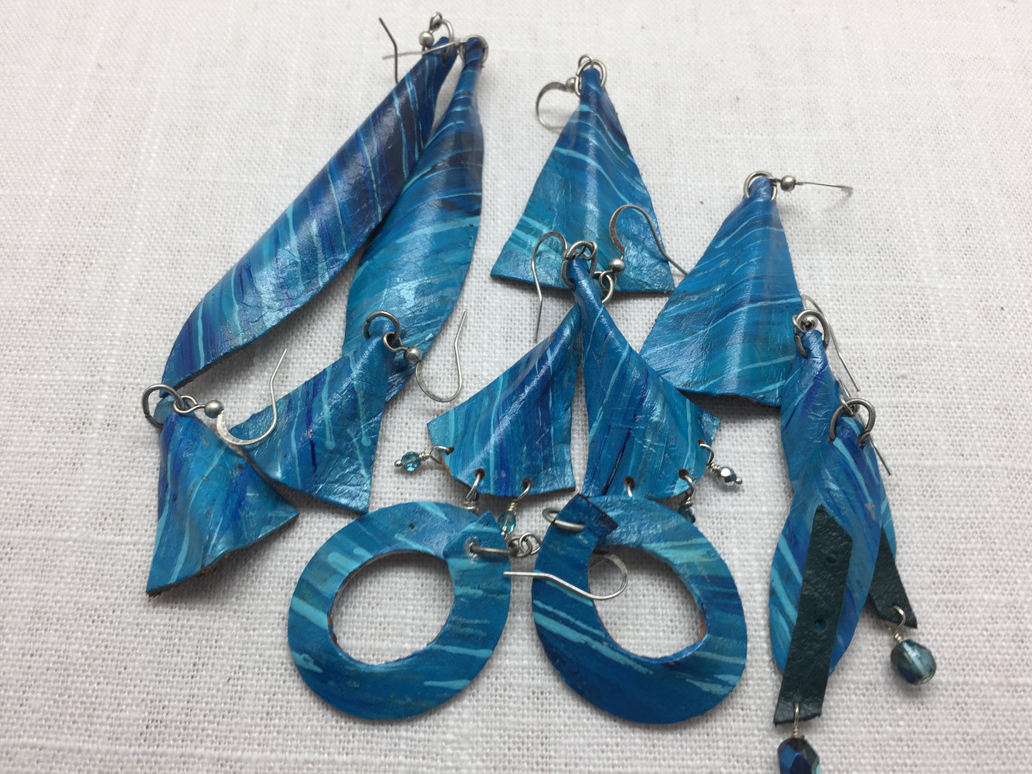 turquoise and silver painted leather earrings