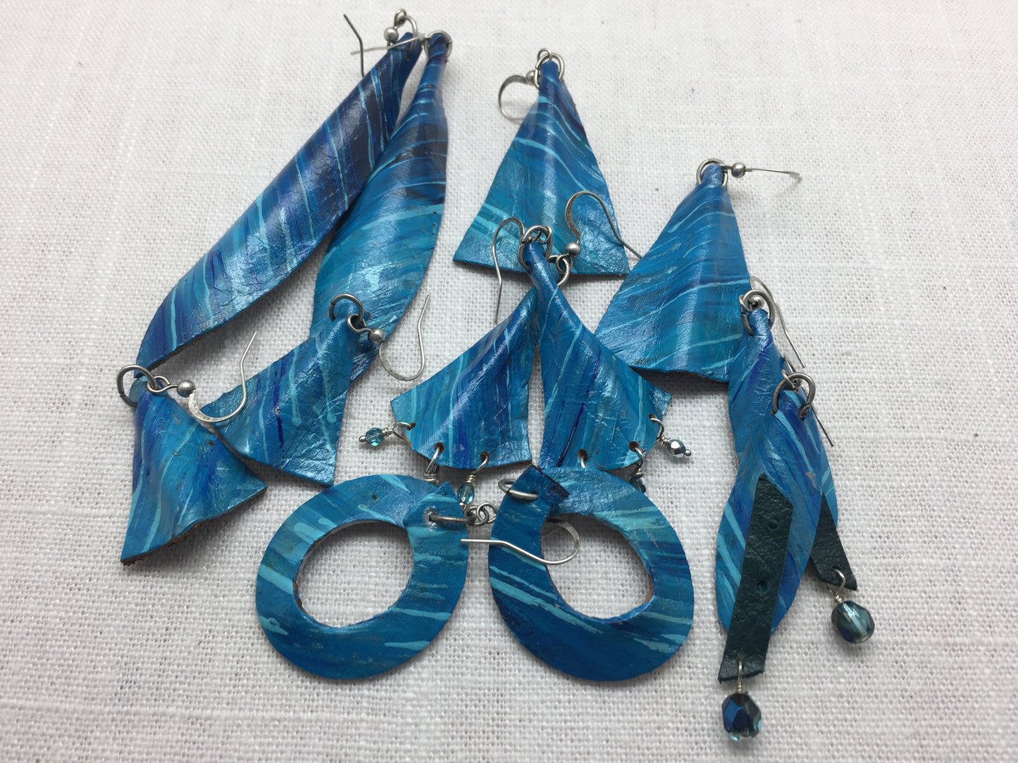 turquoise and silver painted leather earrings