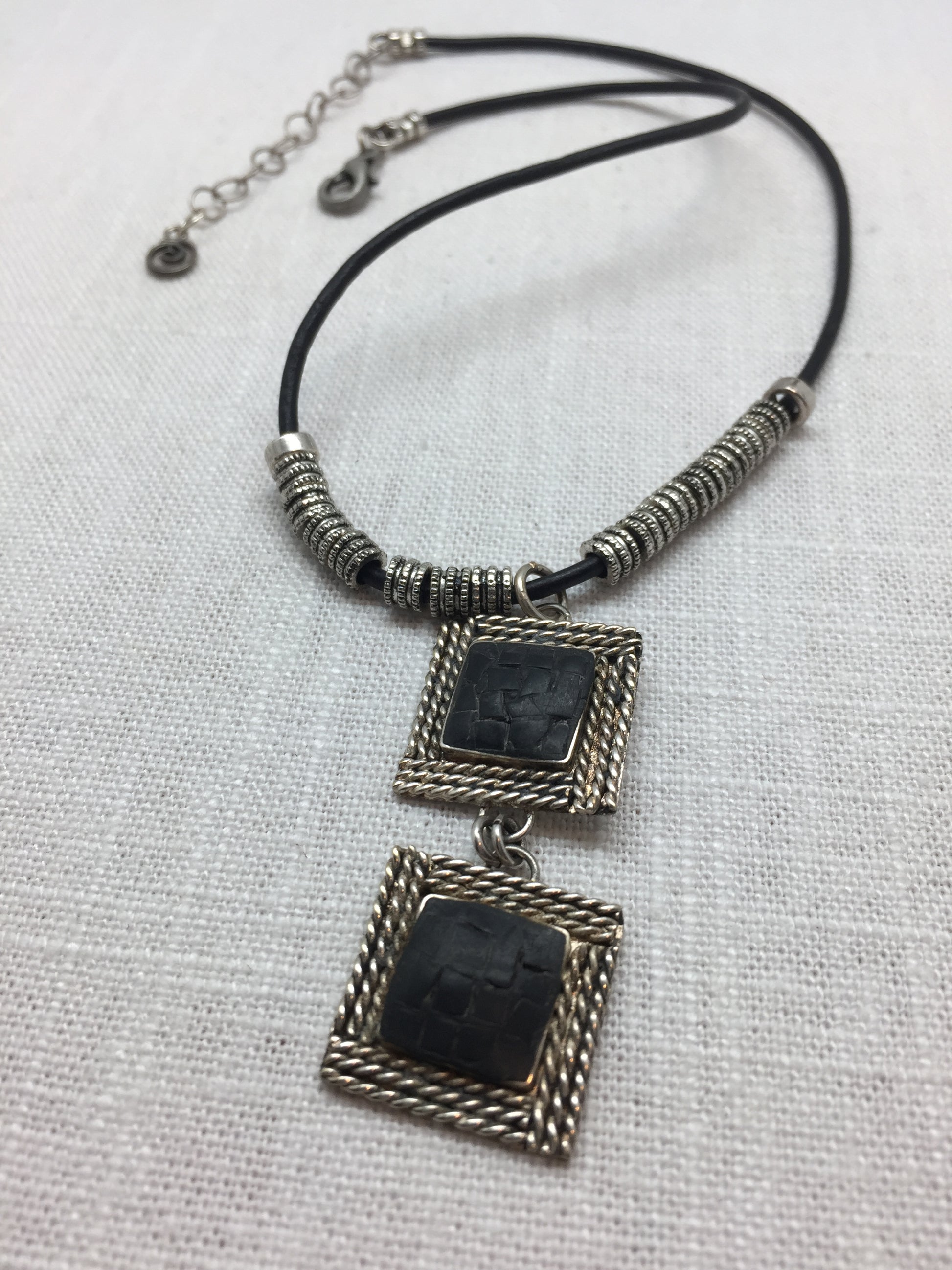 Black mosaic double pendant necklace on leather with antique silver accents