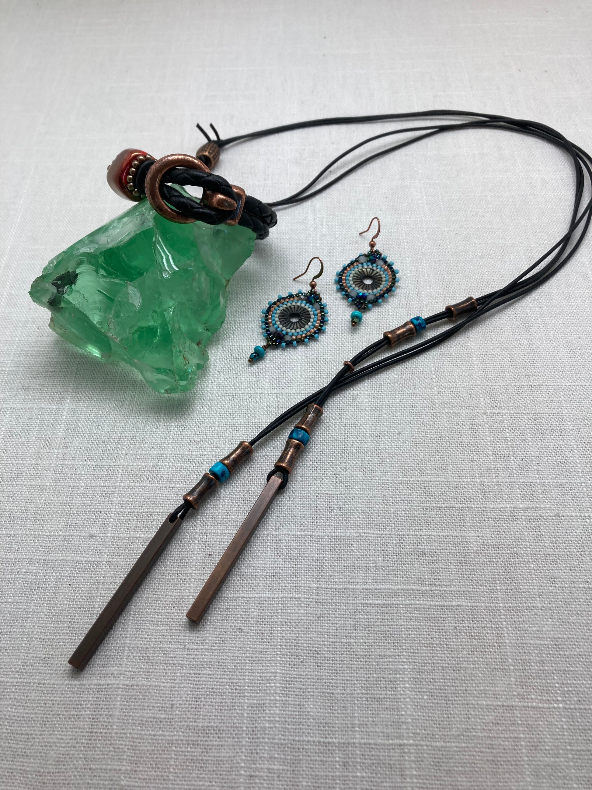 adjustable dark brown leather necklace with turquoise