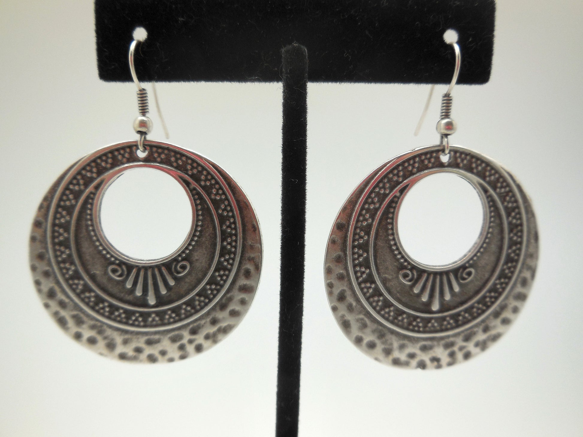 dangle silver earrings with tribal pattern